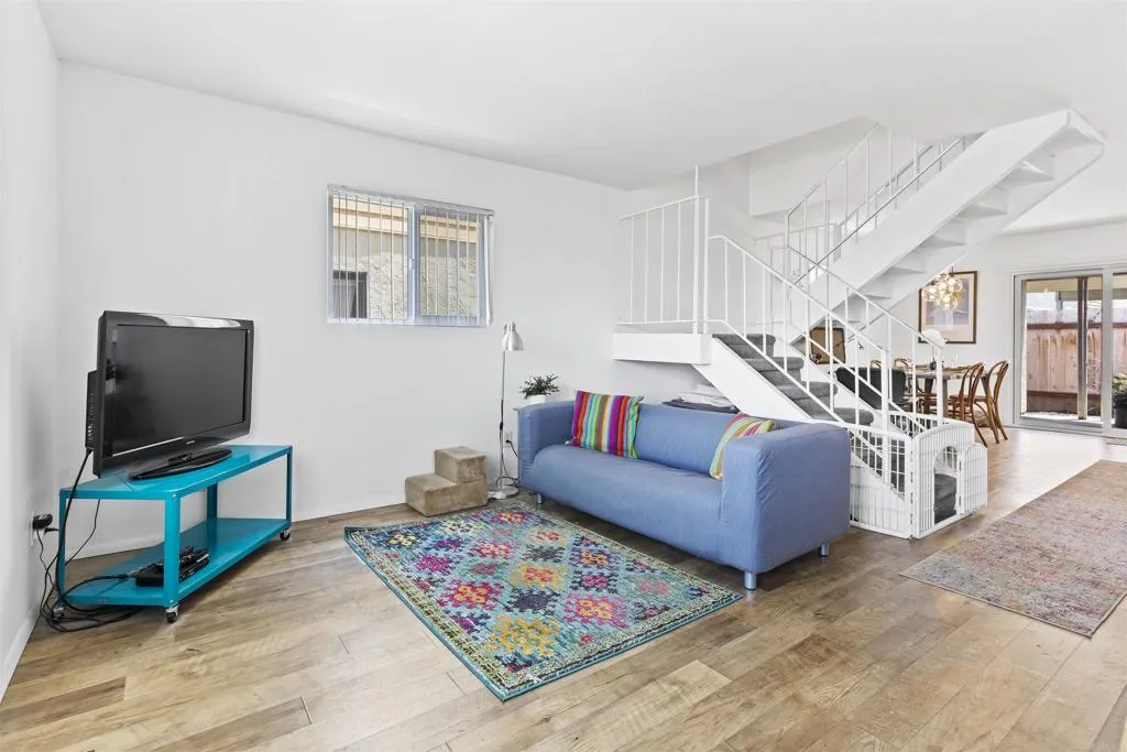 7883 Rancho Fanita Drive, Unit A Santee, CA 92071 - Photo 9 of 27 a living room with furniture and a flat screen tv