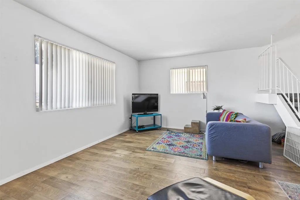 7883 Rancho Fanita Drive, Unit A Santee, CA 92071 - Photo 10 of 27 a living room with furniture and a flat screen tv