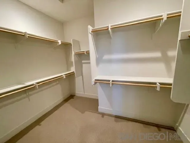 a view of an empty walk in closet