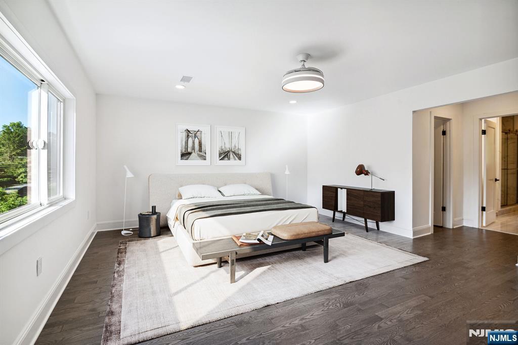 291 Tappan Road Norwood, NJ 07648 - Photo 20 of 26 a bedroom with a bed and a tv