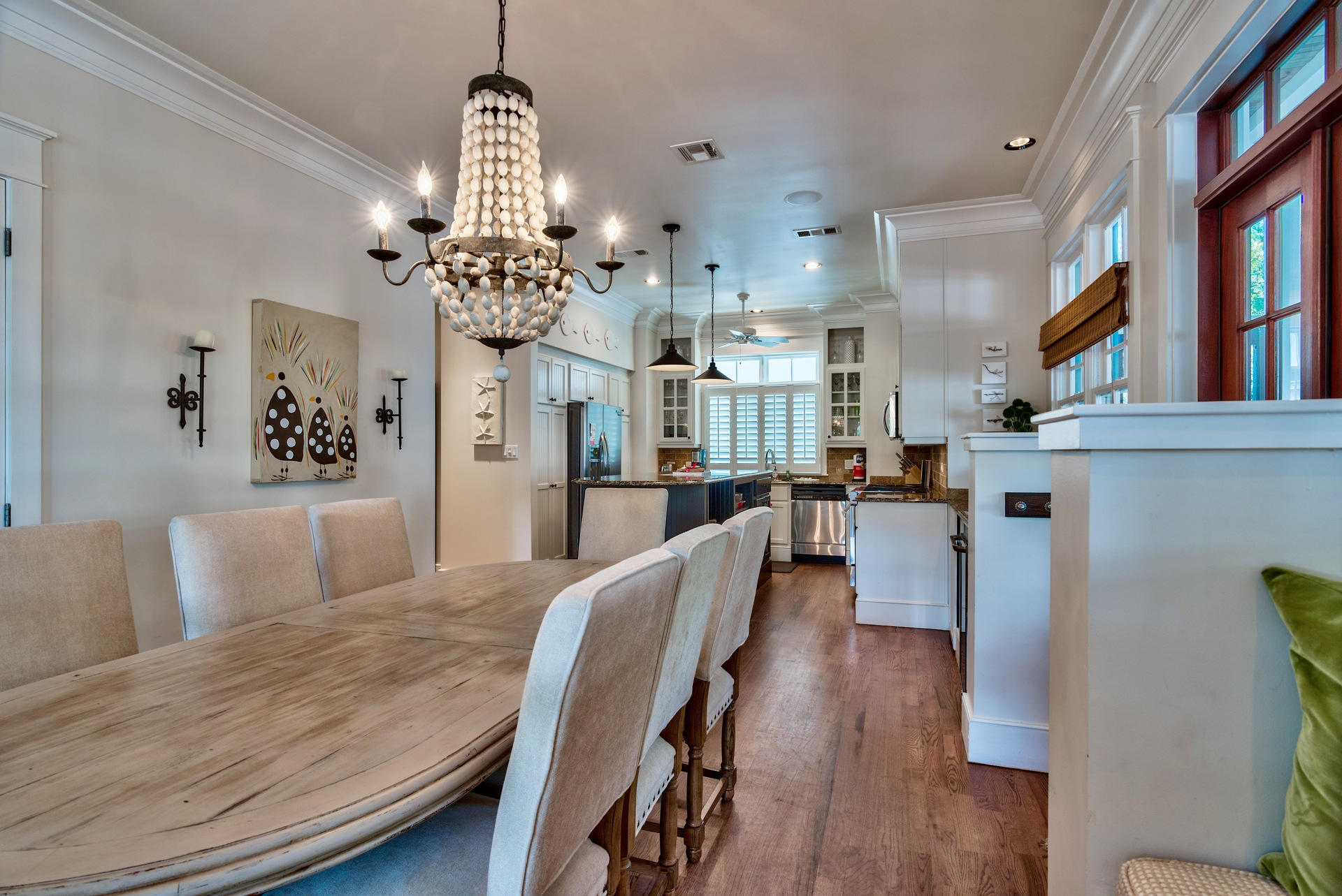 54 Round Road Rosemary Beach, FL 32461 - Photo 13 of 48 a living room with kitchen island furniture and a chandelier
