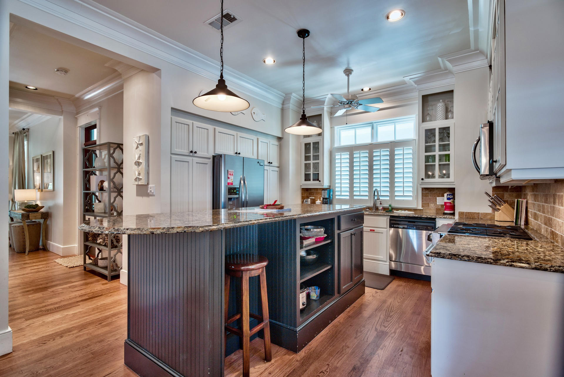 54 Round Road Rosemary Beach, FL 32461 - Photo 14 of 48 a kitchen with stainless steel appliances granite countertop a stove and a wooden floors