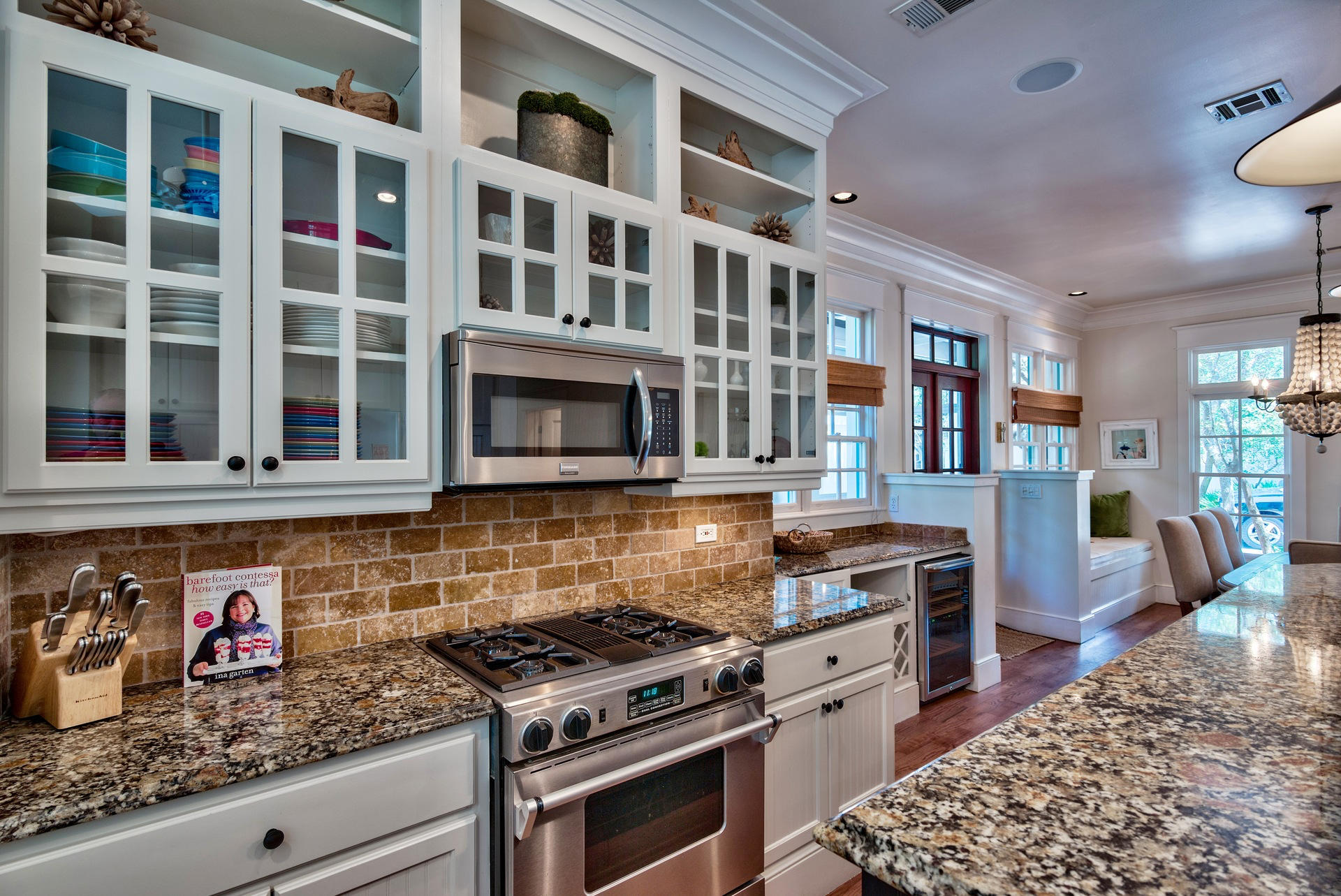 54 Round Road Rosemary Beach, FL 32461 - Photo 16 of 48 a kitchen with stainless steel appliances granite countertop a stove and a sink