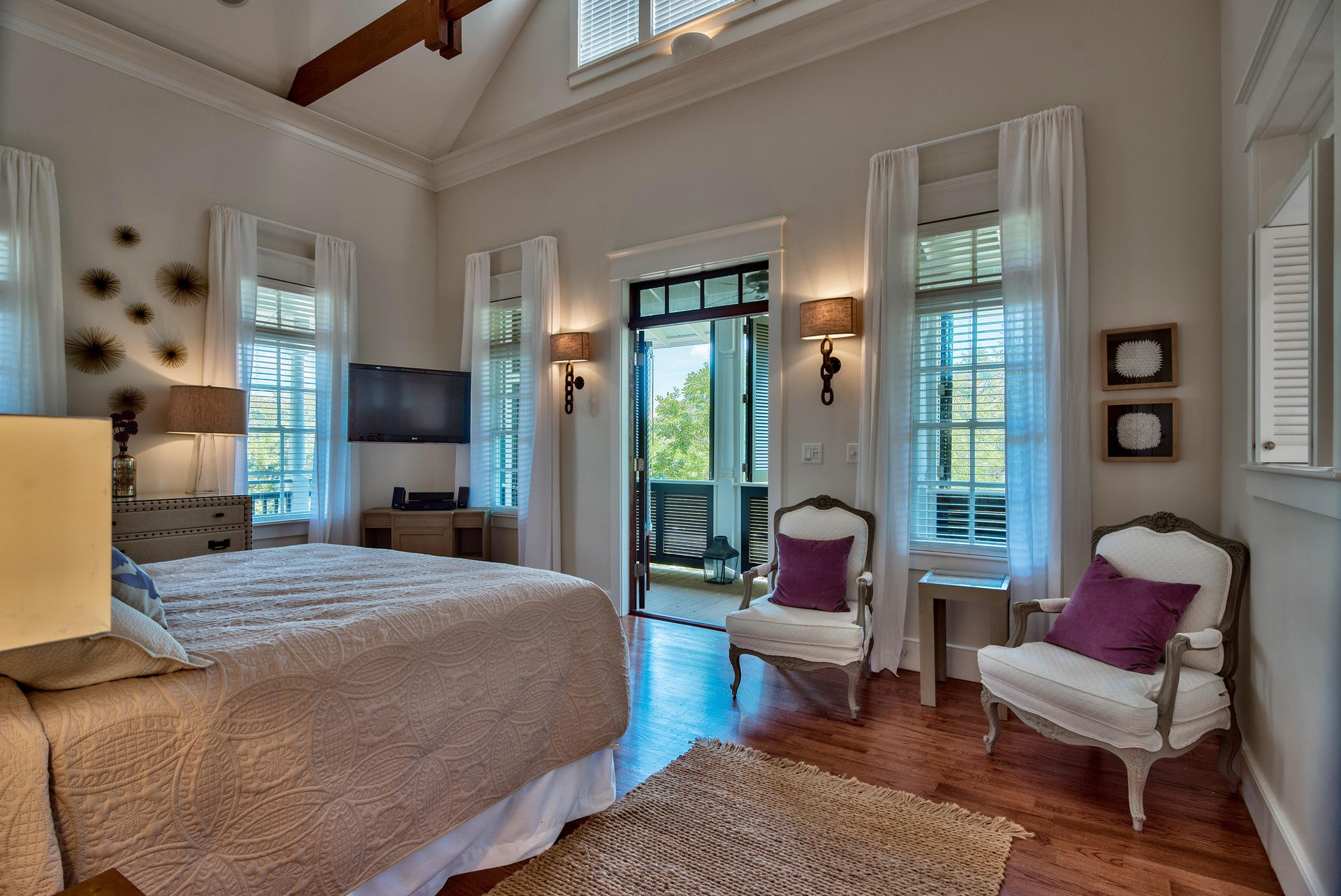 54 Round Road Rosemary Beach, FL 32461 - Photo 17 of 48 a bedroom with a bed chair and glass door