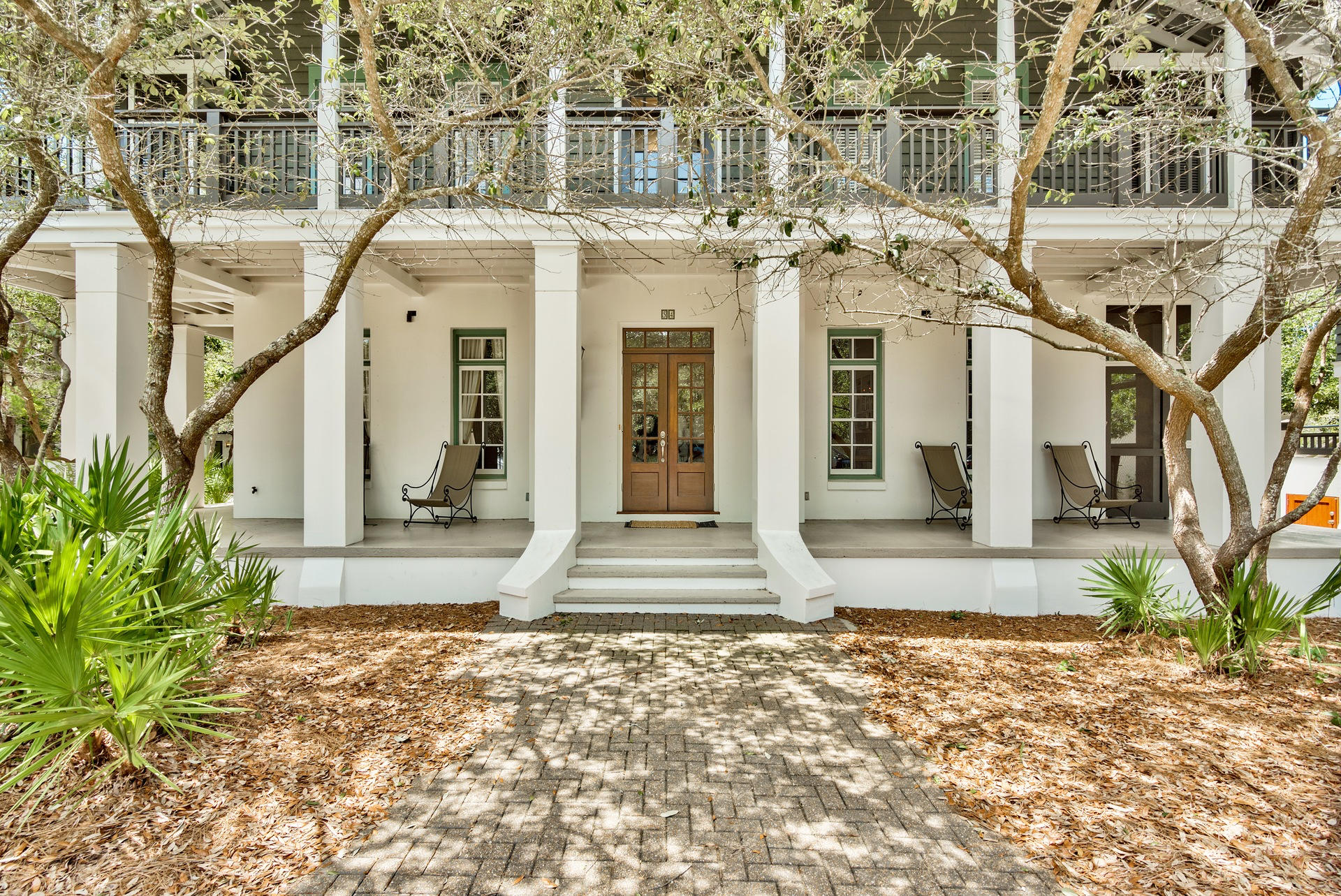 54 Round Road Rosemary Beach, FL 32461 - Photo 3 of 48 a front view of a house with a yard