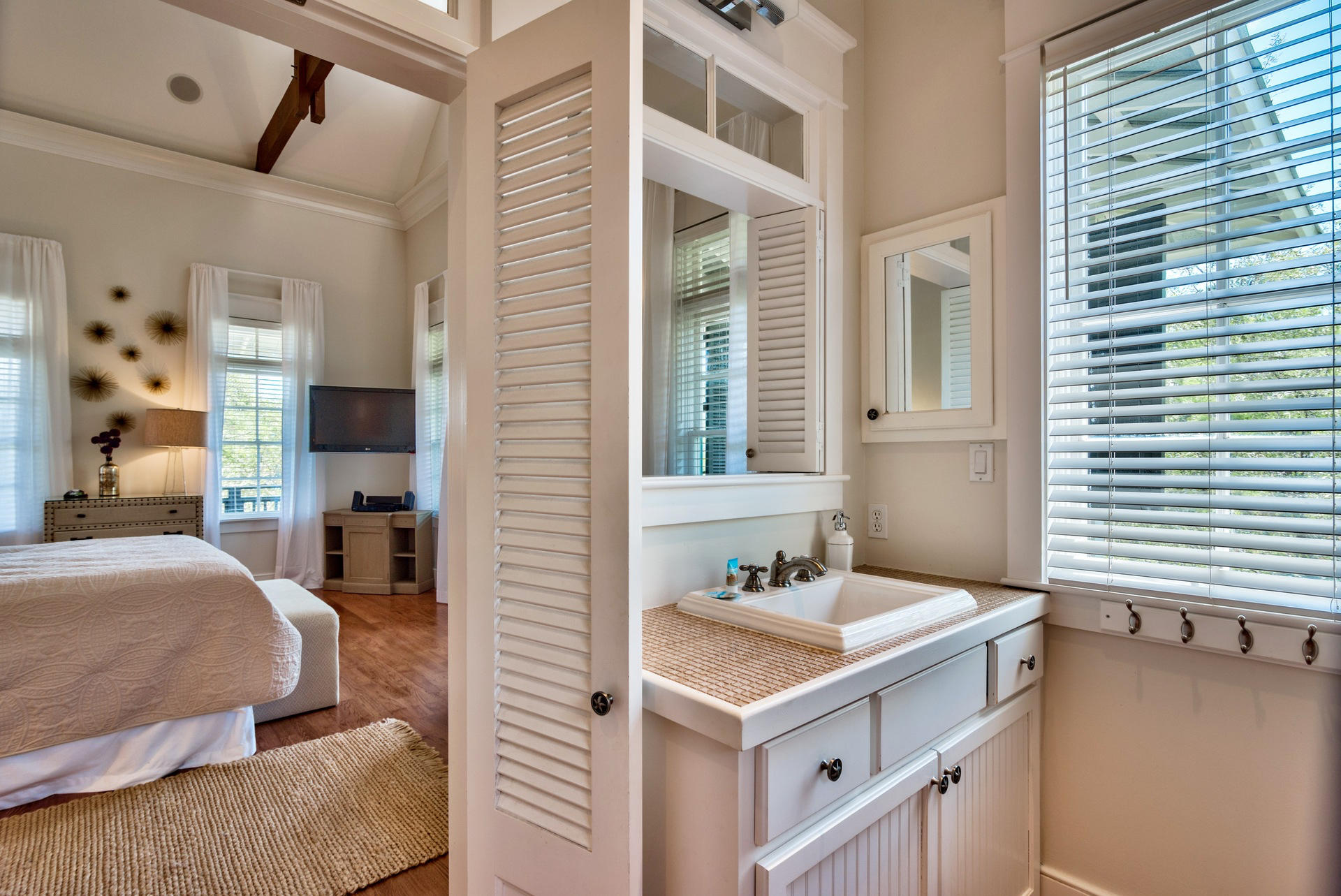 54 Round Road Rosemary Beach, FL 32461 - Photo 23 of 48 a en suite bathroom with a sink and a mirror