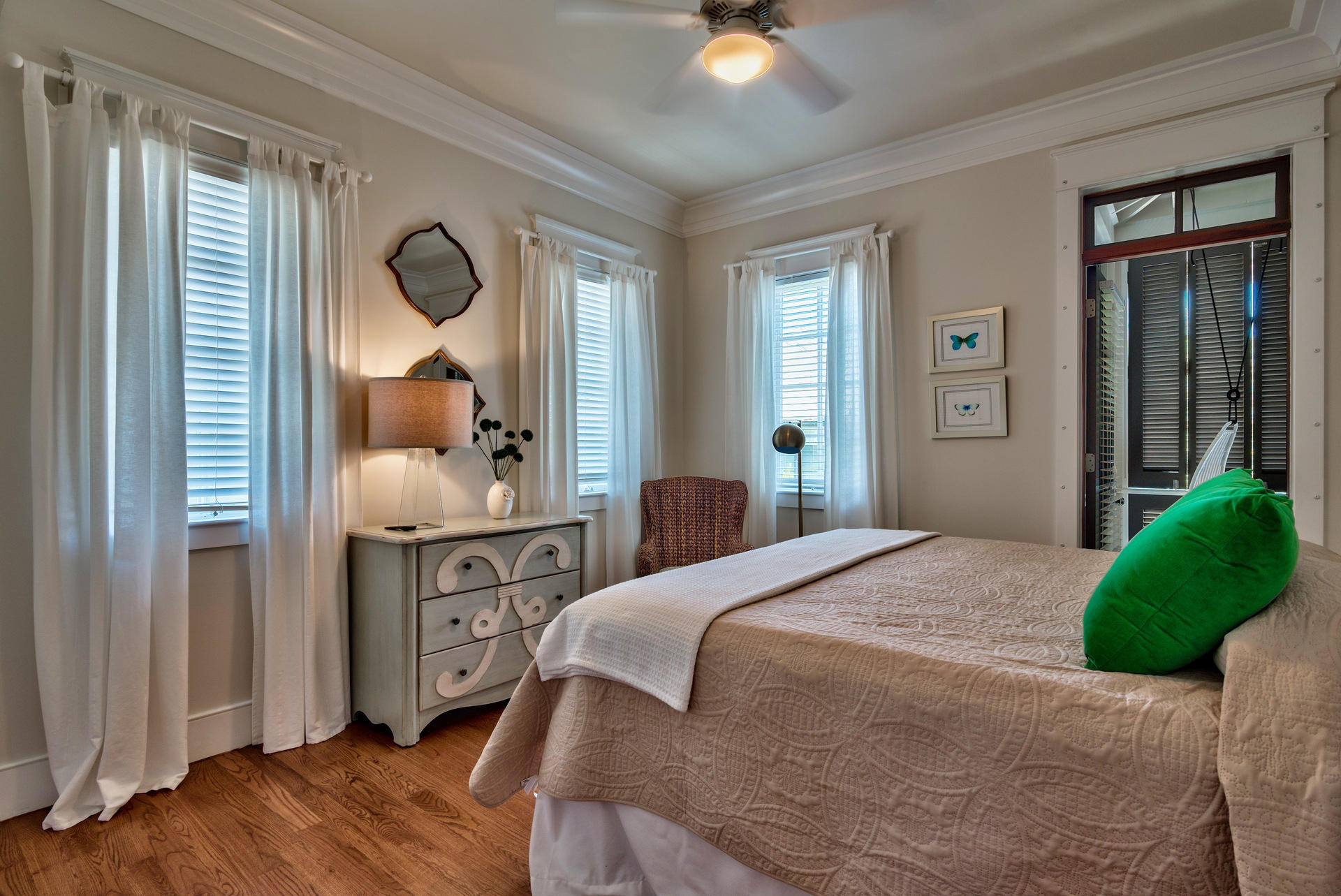 54 Round Road Rosemary Beach, FL 32461 - Photo 29 of 48 a bedroom with a bed and a mirror