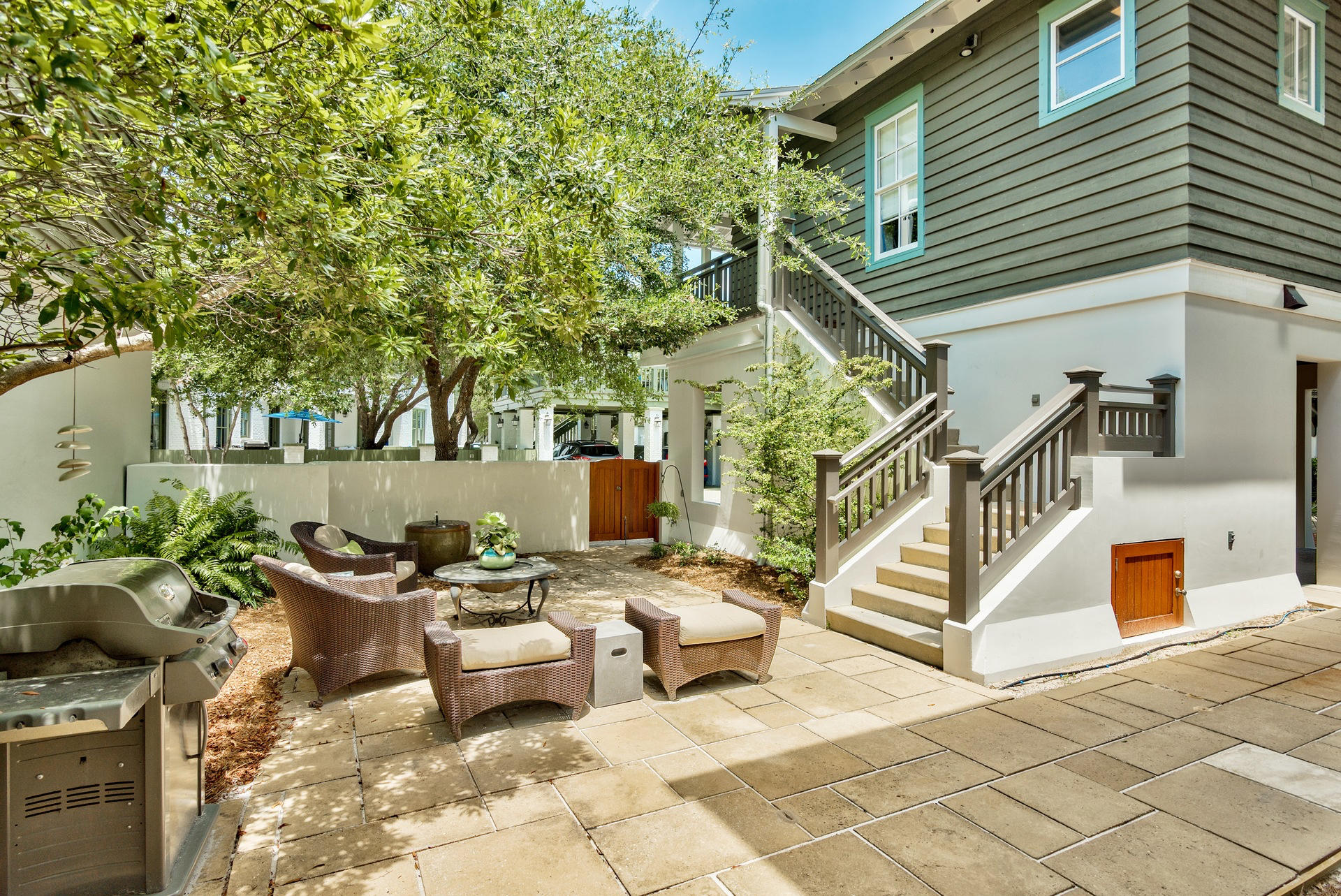 54 Round Road Rosemary Beach, FL 32461 - Photo 35 of 48 a view of a patio with couches table and chairs and potted plants