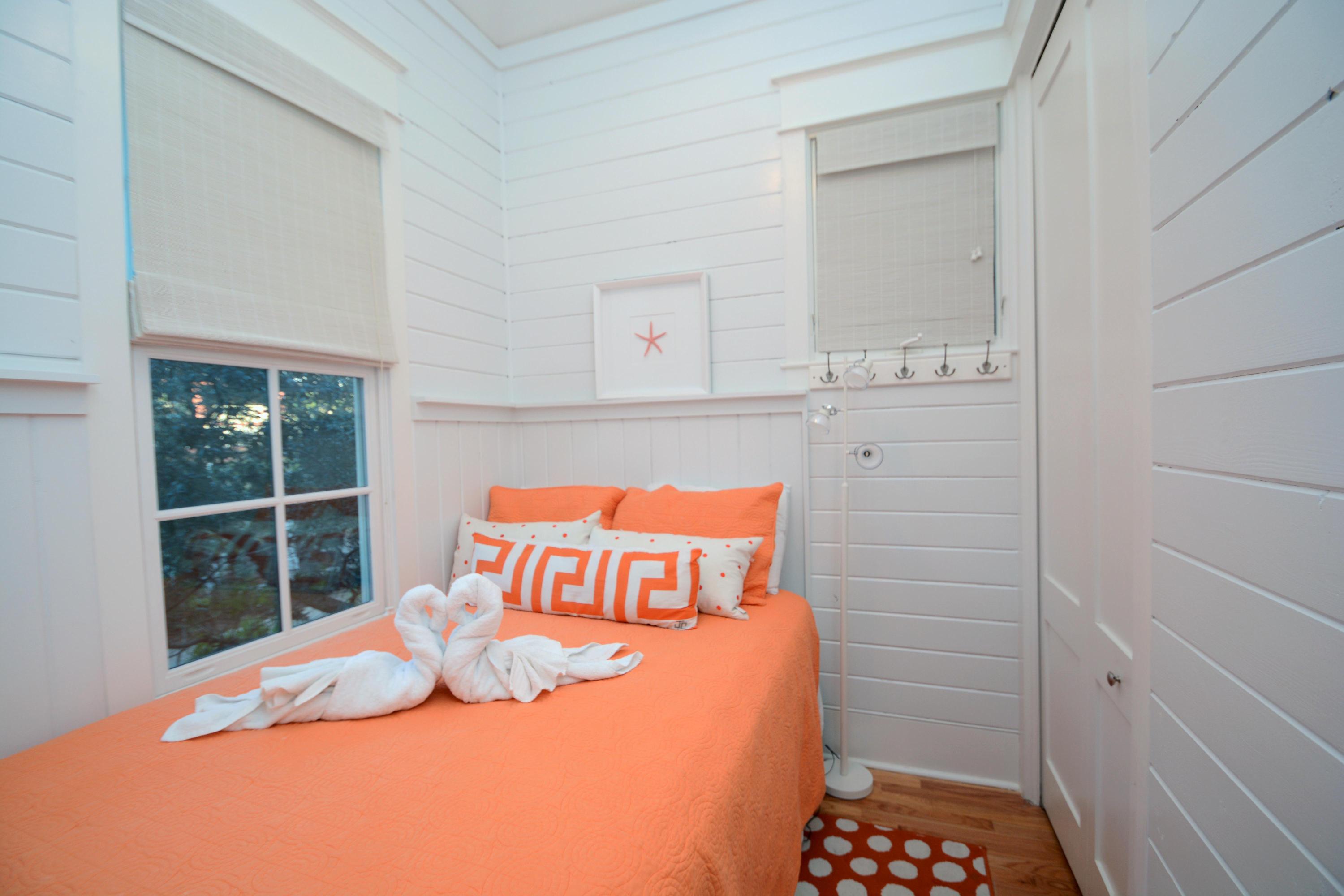 54 Round Road Rosemary Beach, FL 32461 - Photo 39 of 48 a bedroom with a bed and window