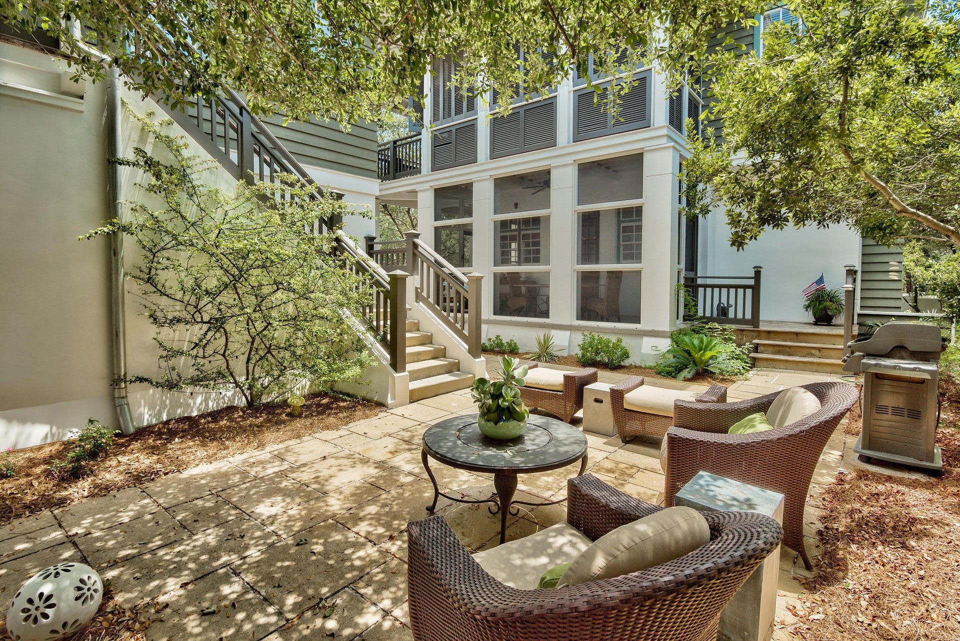 54 Round Road Rosemary Beach, FL 32461 - Photo 5 of 48 a backyard of a house with fire pit and outdoor seating