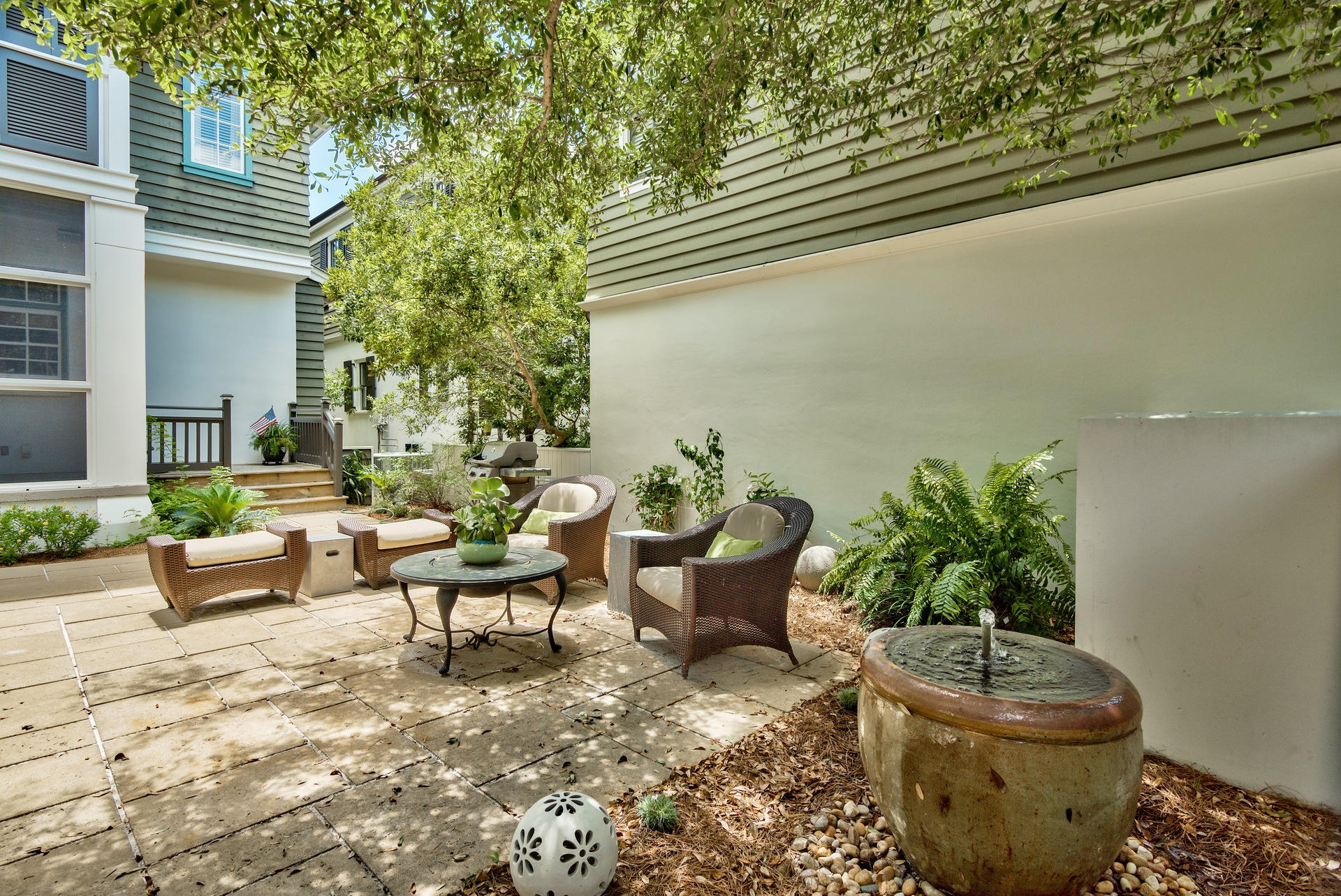 54 Round Road Rosemary Beach, FL 32461 - Photo 6 of 48 a view of a patio with couple of chairs and a potted plant