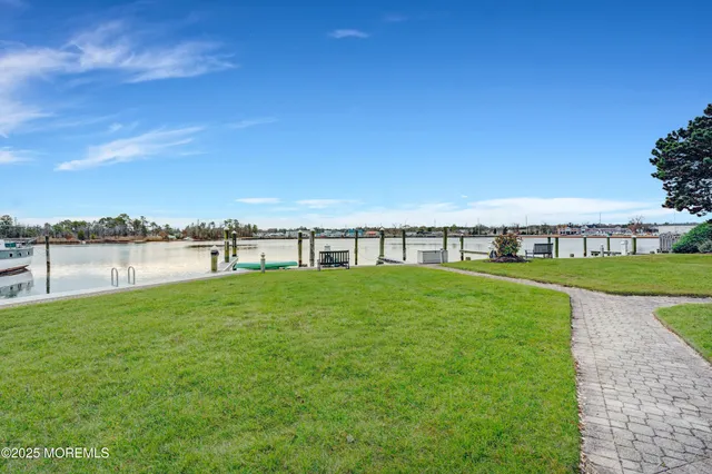 a view of a chairs and table in the balcony