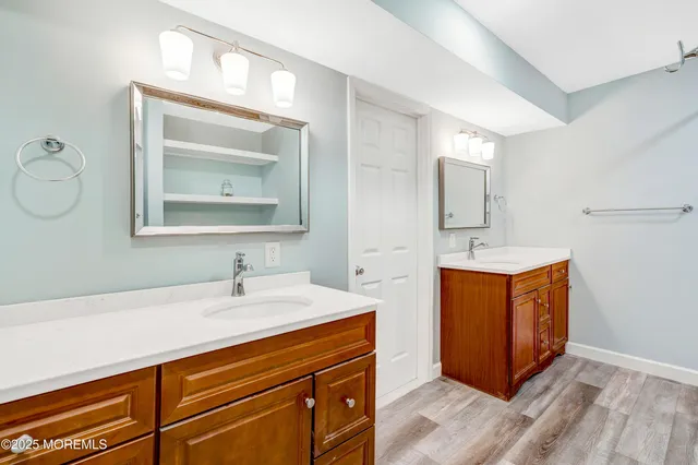 a bedroom with a bed and a lamp