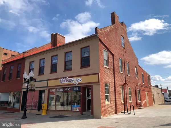 a view of a building with a street