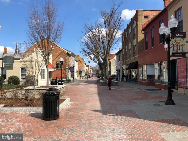 a street view with large buildings