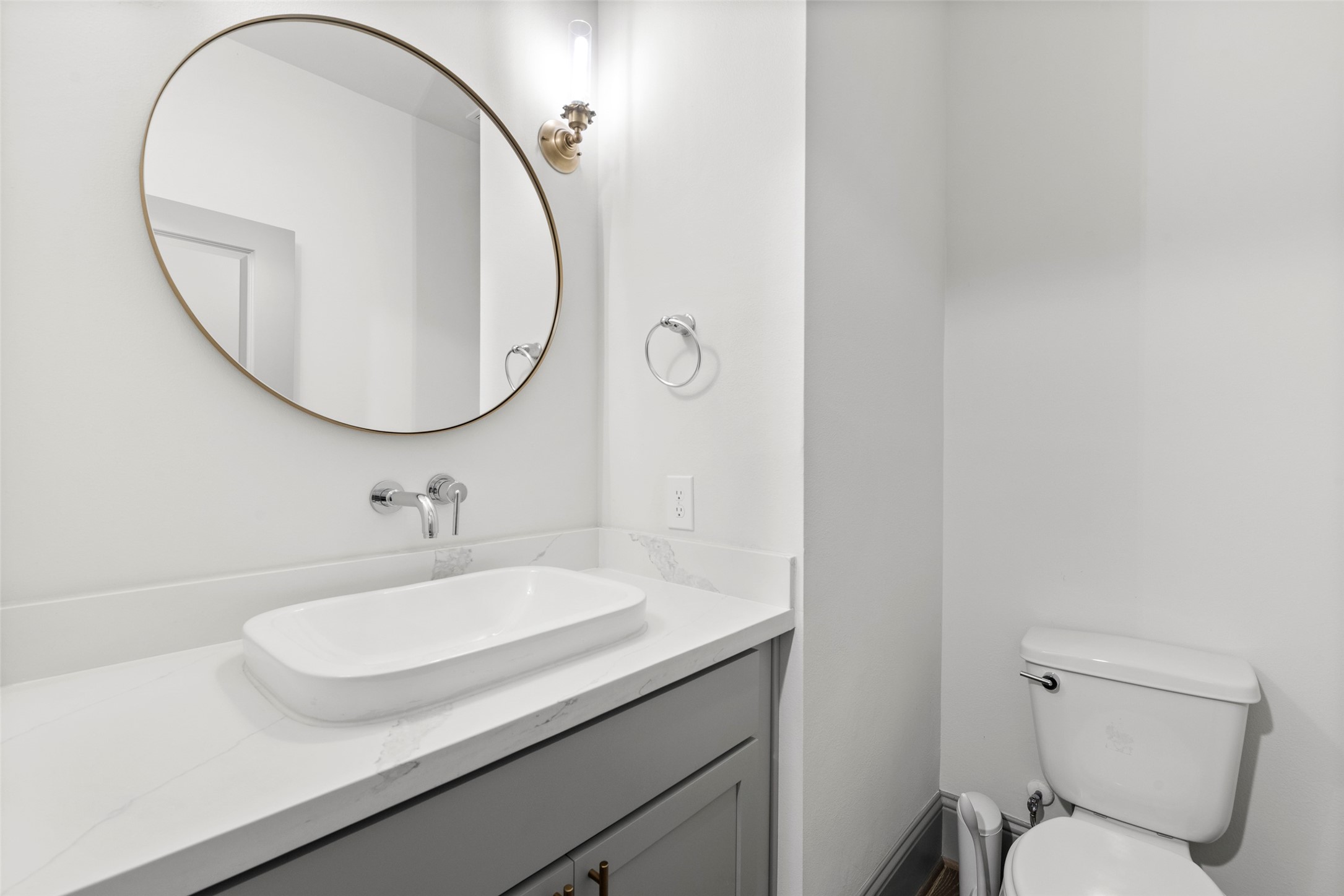 1719 Holman Street Houston, TX 77004 - Photo 13 of 40 a bathroom with a sink and a mirror