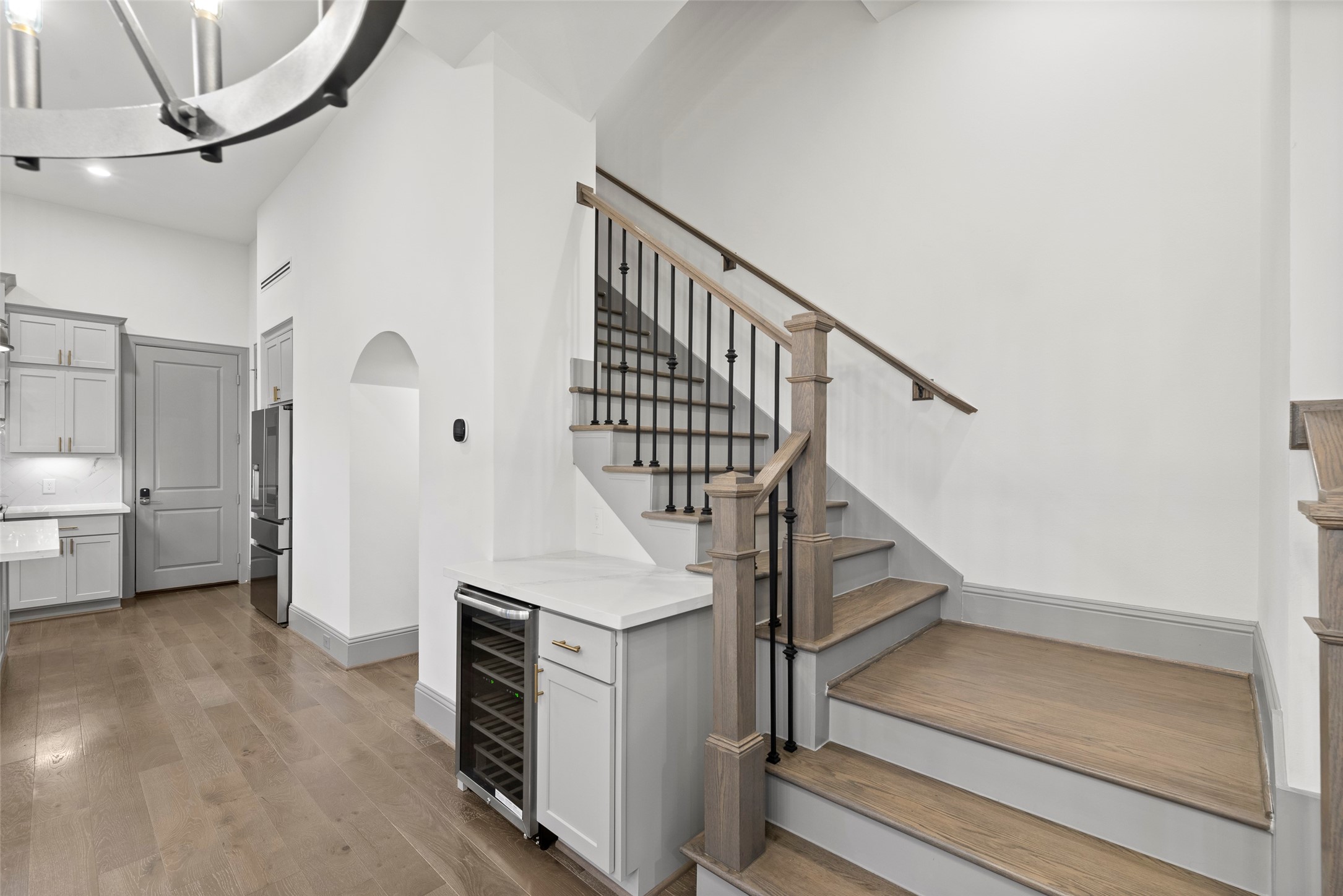 1719 Holman Street Houston, TX 77004 - Photo 14 of 40 a view of entryway and hall with wooden floor