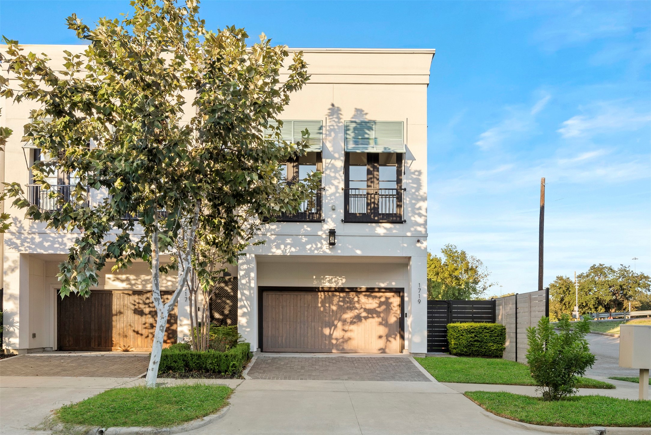 1719 Holman Street Houston, TX 77004 - Photo 2 of 40 a front view of a house with garden