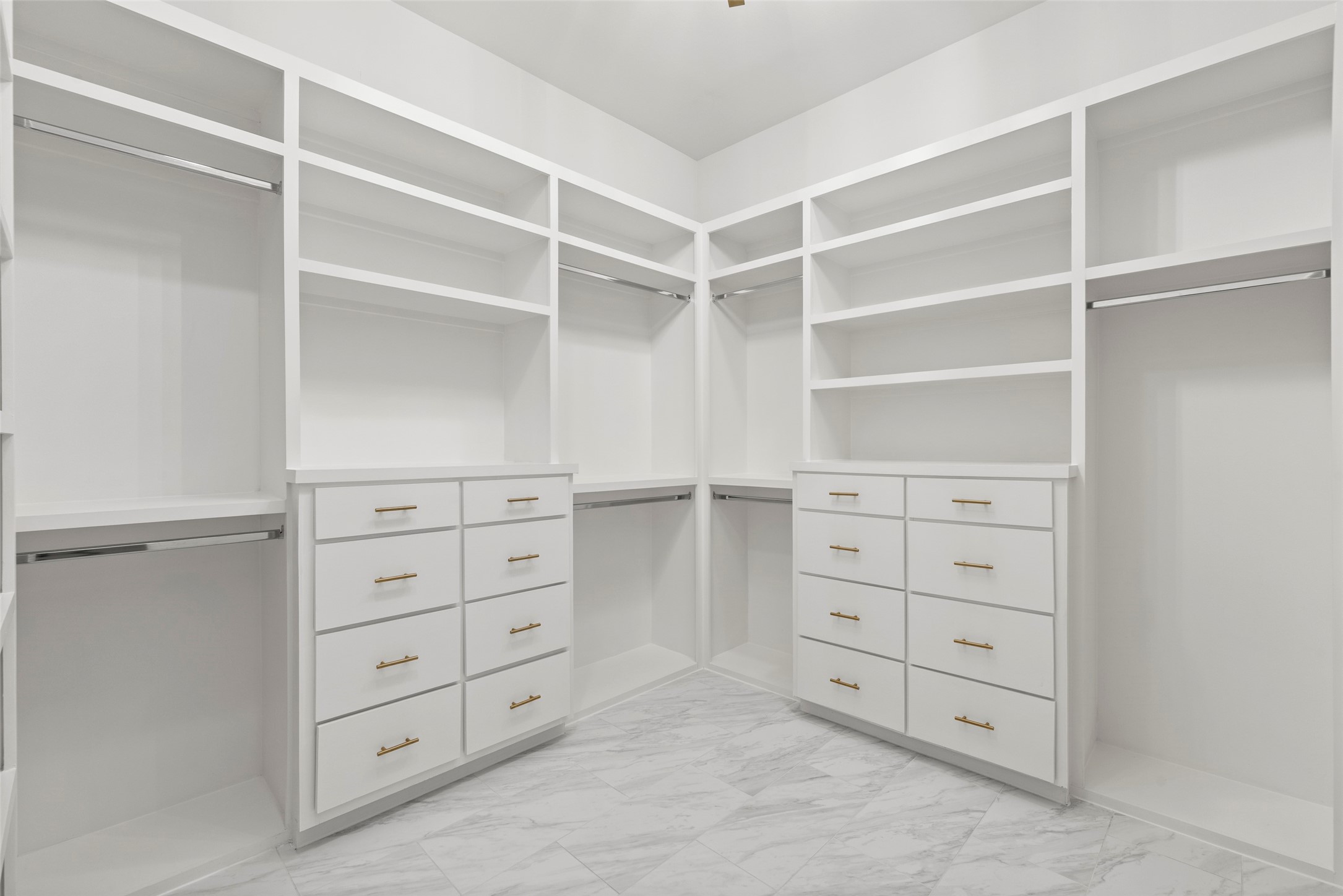 1719 Holman Street Houston, TX 77004 - Photo 22 of 40 a view of walk in closet with empty racks