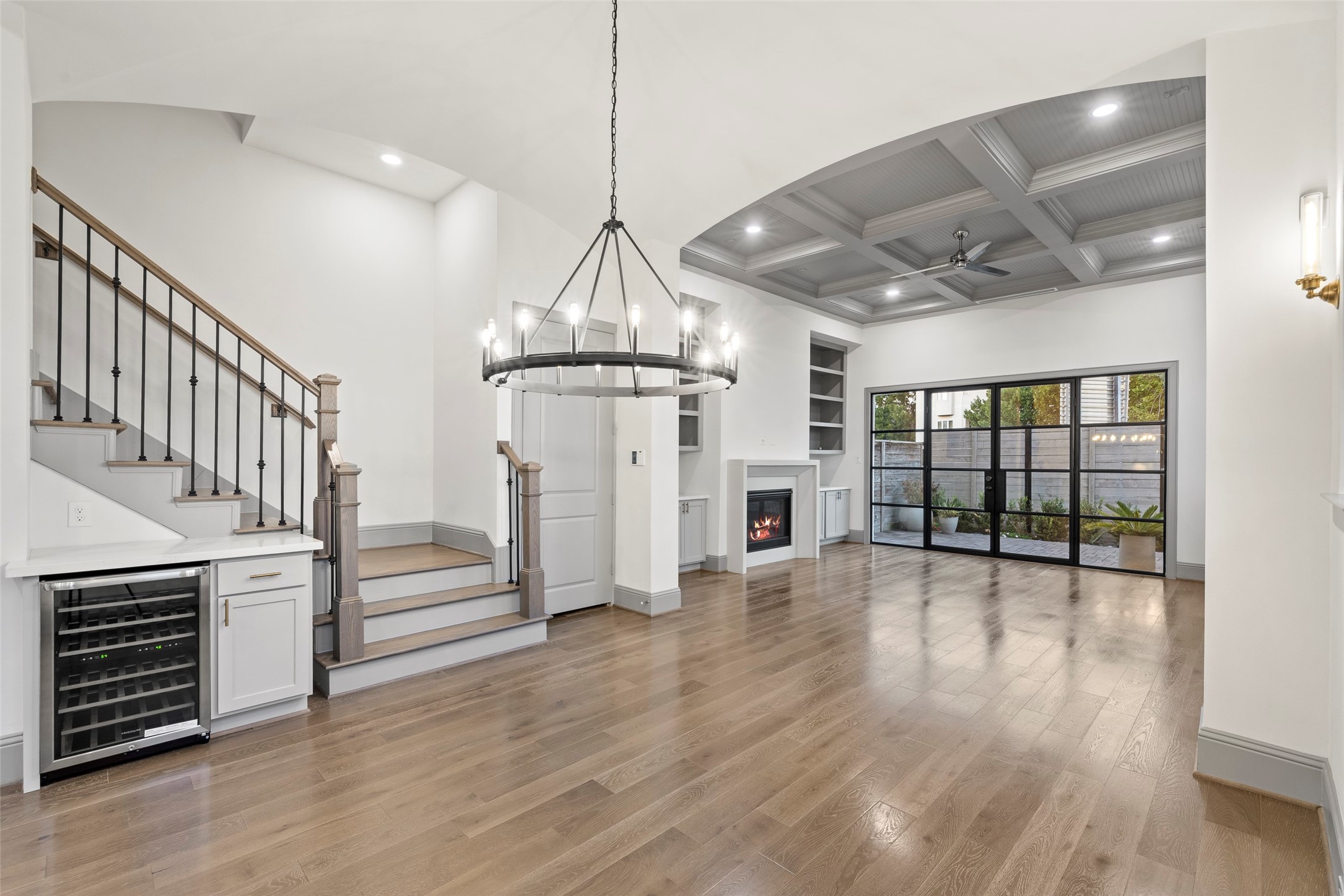 1719 Holman Street Houston, TX 77004 - Photo 5 of 40 a view of empty room with wooden floor and fireplace