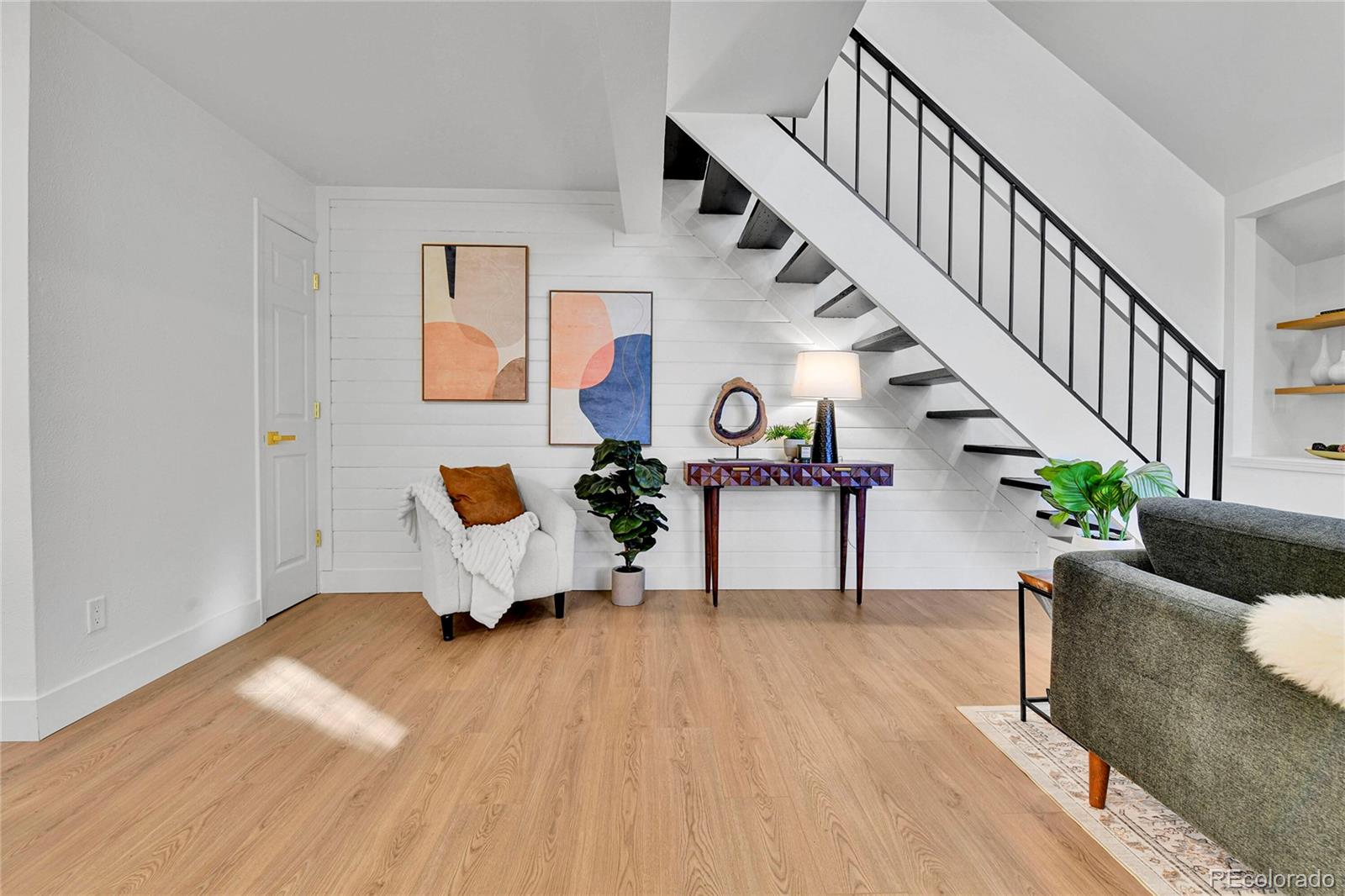 4878 East Kentucky Avenue, Unit E Denver, CO 80246 - Photo 3 of 19 a view of entryway and hall with wooden floor