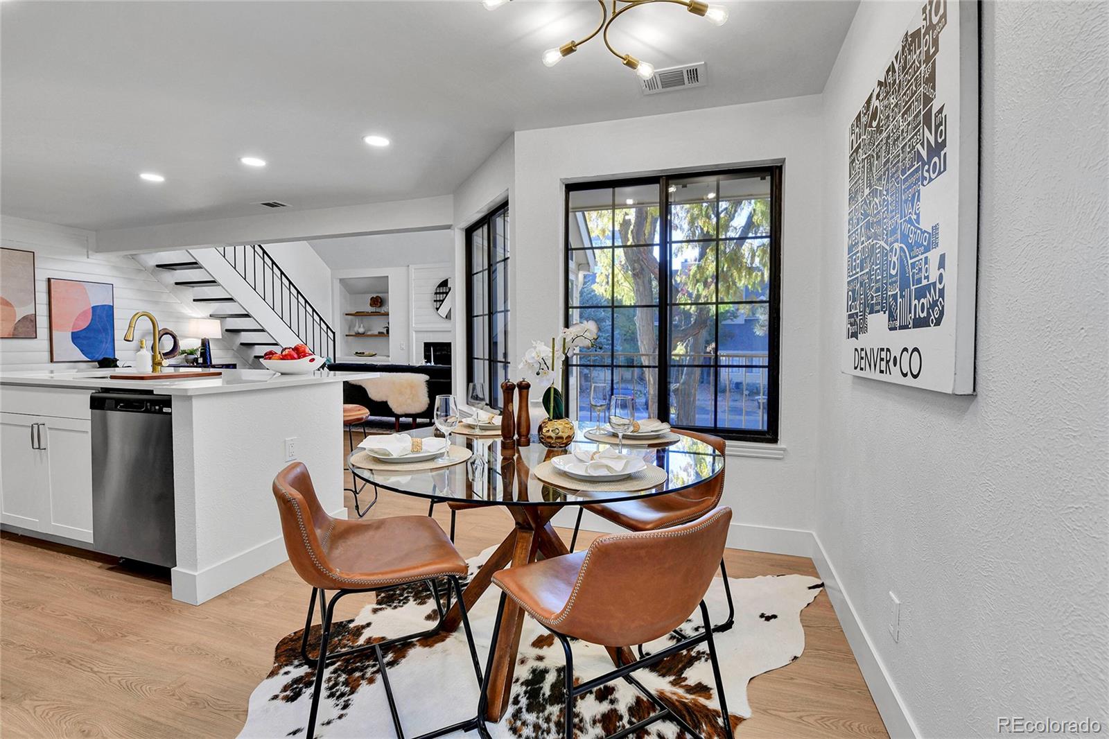 4878 East Kentucky Avenue, Unit E Denver, CO 80246 - Photo 8 of 19 a dining room with furniture and window
