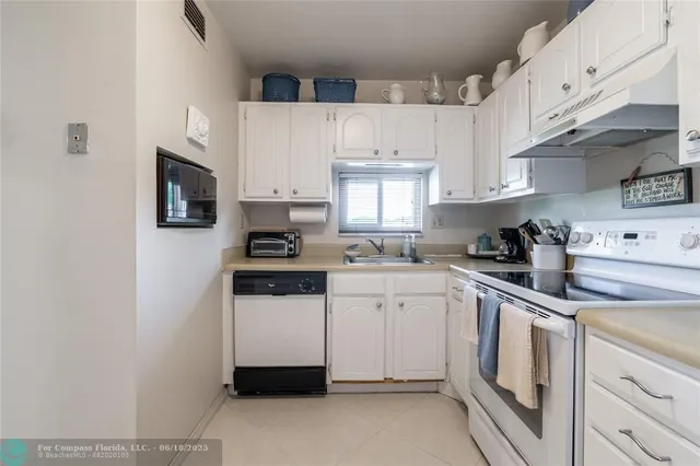 a view of a hallway with a wooden floor