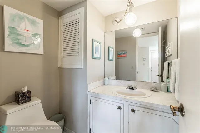 a view of a swimming pool with outdoor seating