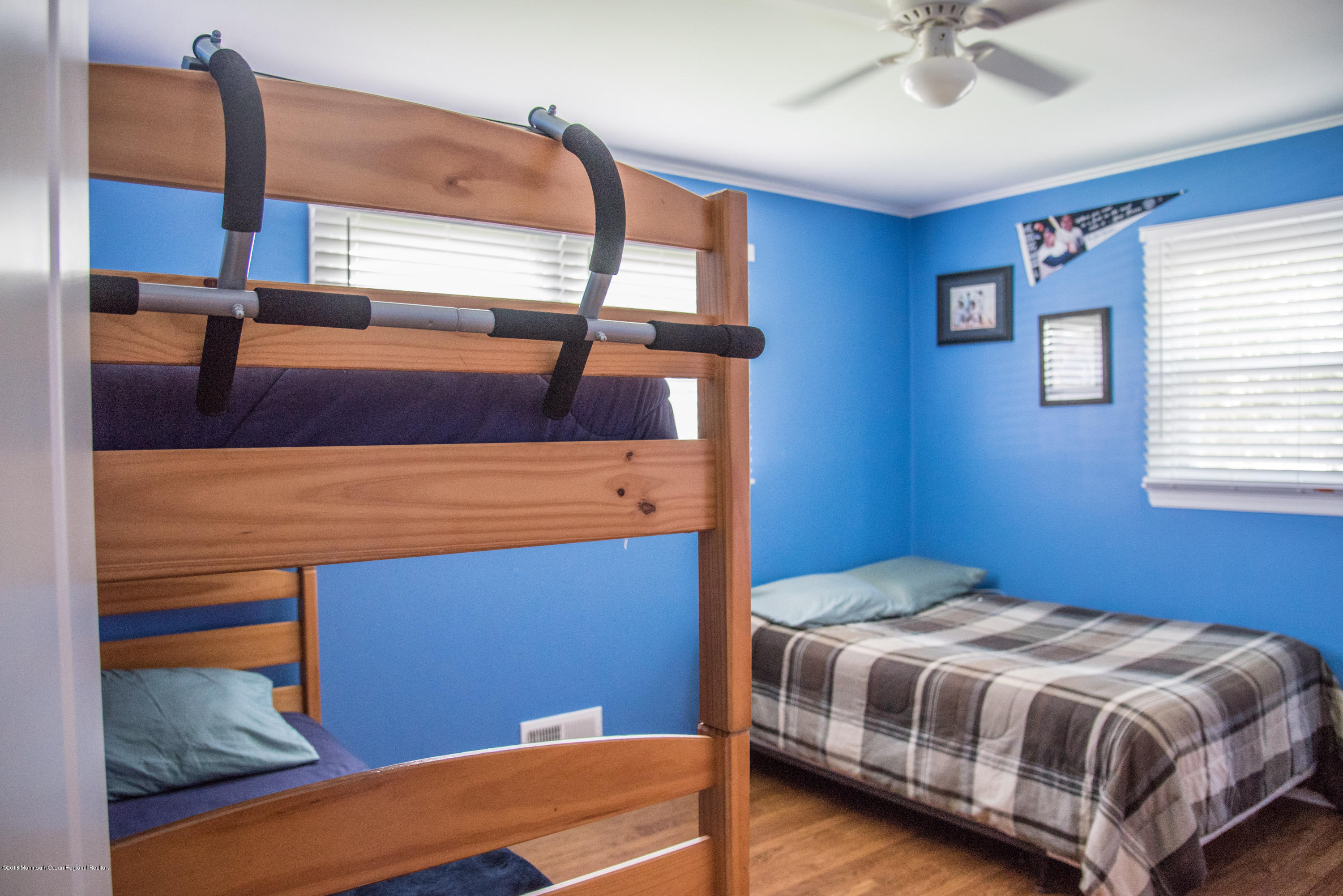 813 Beaver Dam Road Point Pleasant, NJ 08742 - Photo 14 of 27 a bedroom with a bed and window