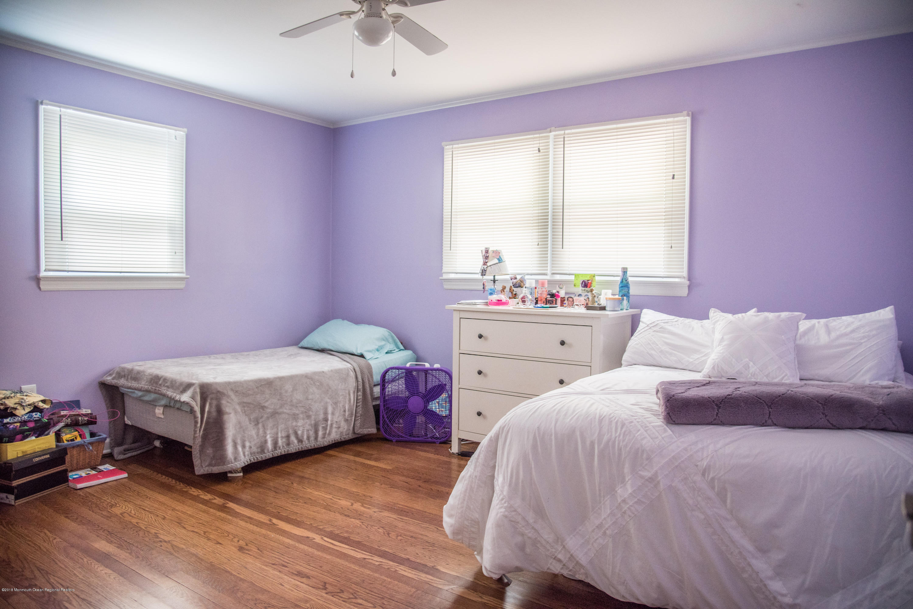 813 Beaver Dam Road Point Pleasant, NJ 08742 - Photo 15 of 27 a bedroom with a bed and a window
