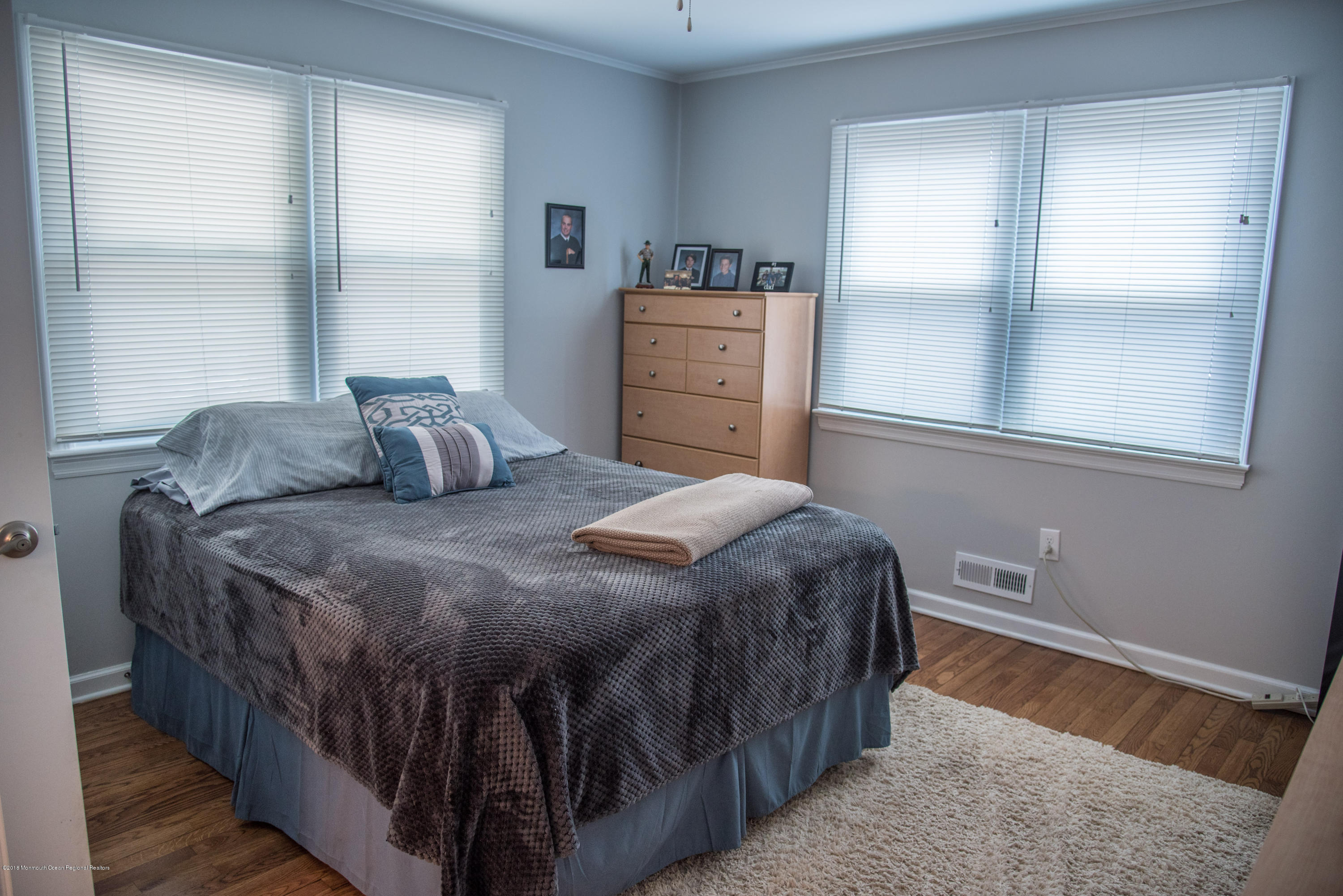 813 Beaver Dam Road Point Pleasant, NJ 08742 - Photo 16 of 27 a bedroom with a bed and a window