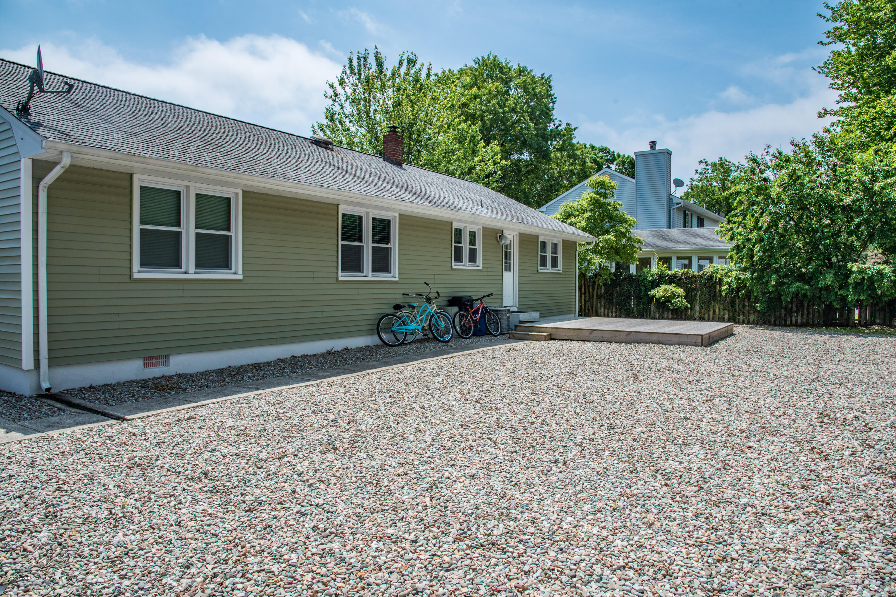 813 Beaver Dam Road Point Pleasant, NJ 08742 - Photo 24 of 27 a front view of a house with garden
