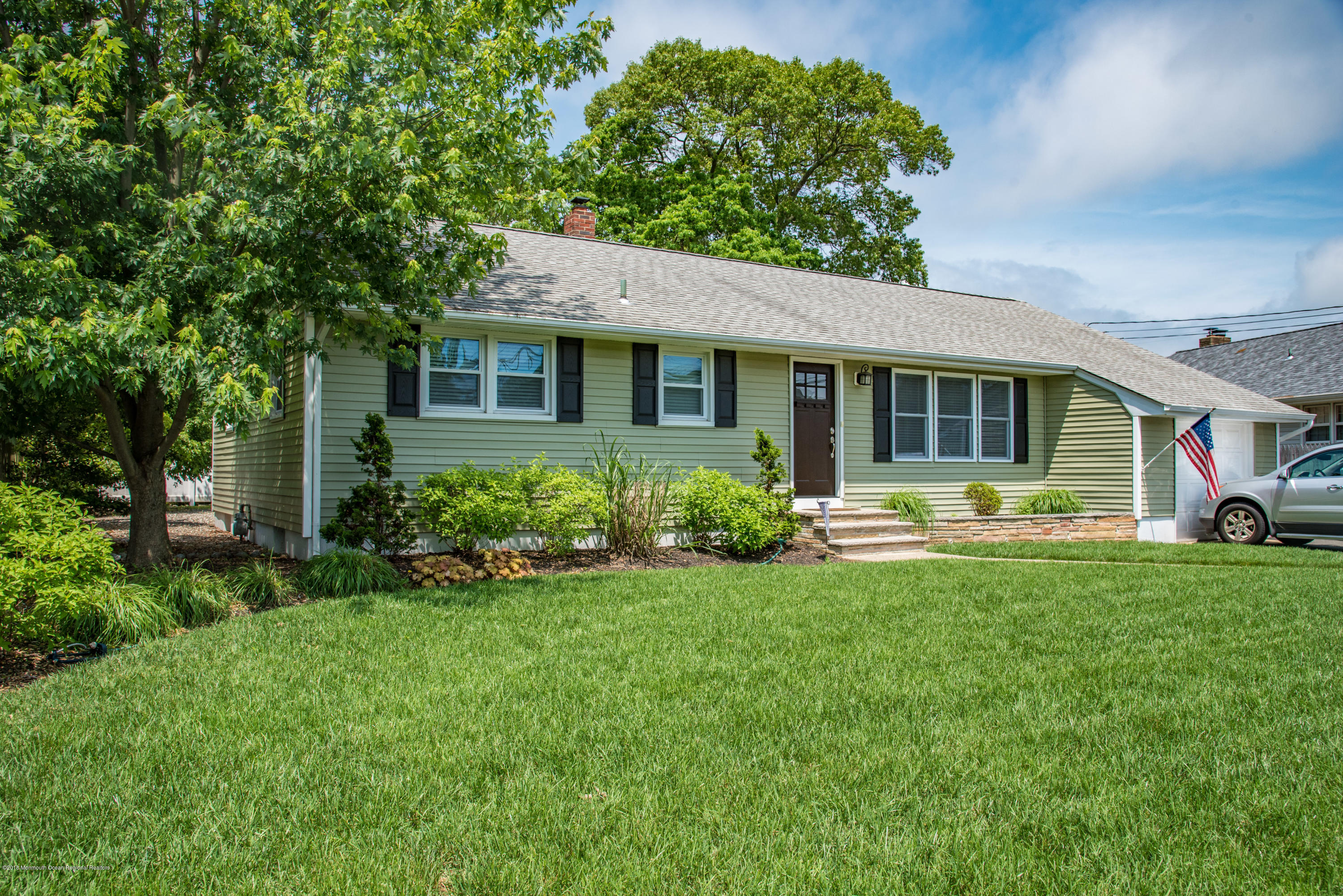 813 Beaver Dam Road Point Pleasant, NJ 08742 - Photo 3 of 27 a front view of house with yard and green space
