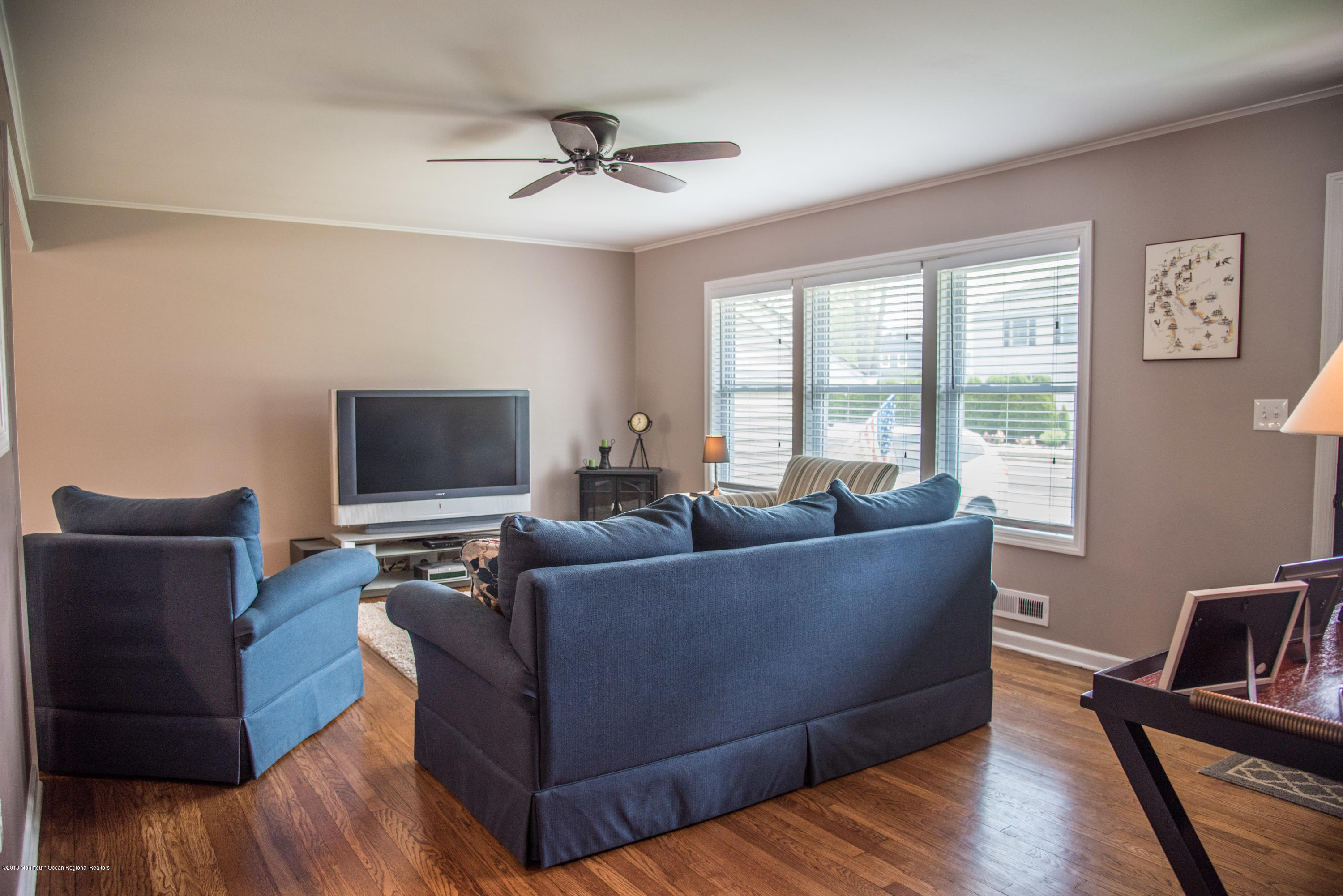813 Beaver Dam Road Point Pleasant, NJ 08742 - Photo 6 of 27 a living room with furniture and a flat screen tv