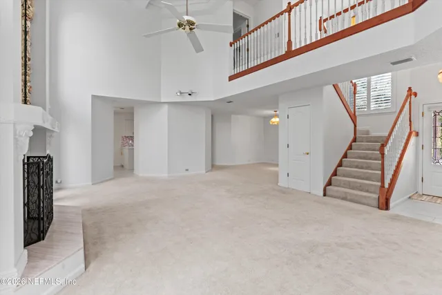a view of a hallway with staircase