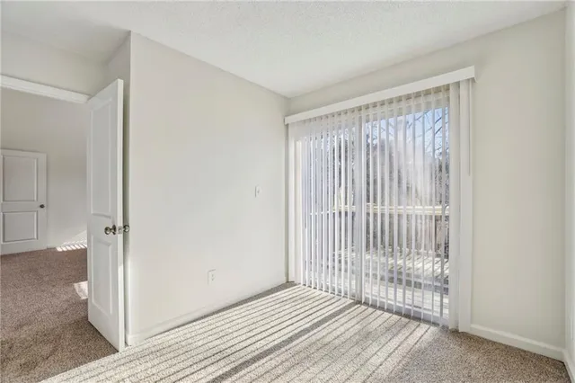 a view of a livingroom with wooden floor