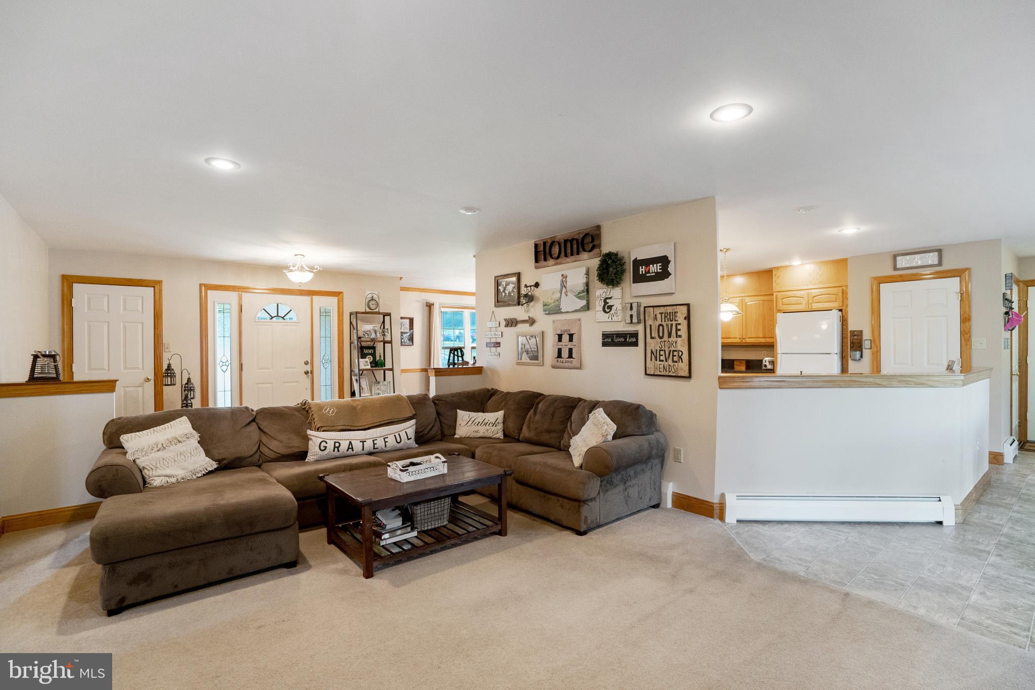 1714 Keith Drive Hellertown, PA 18055 - Photo 11 of 31 Living room is off the kitchen and entryway