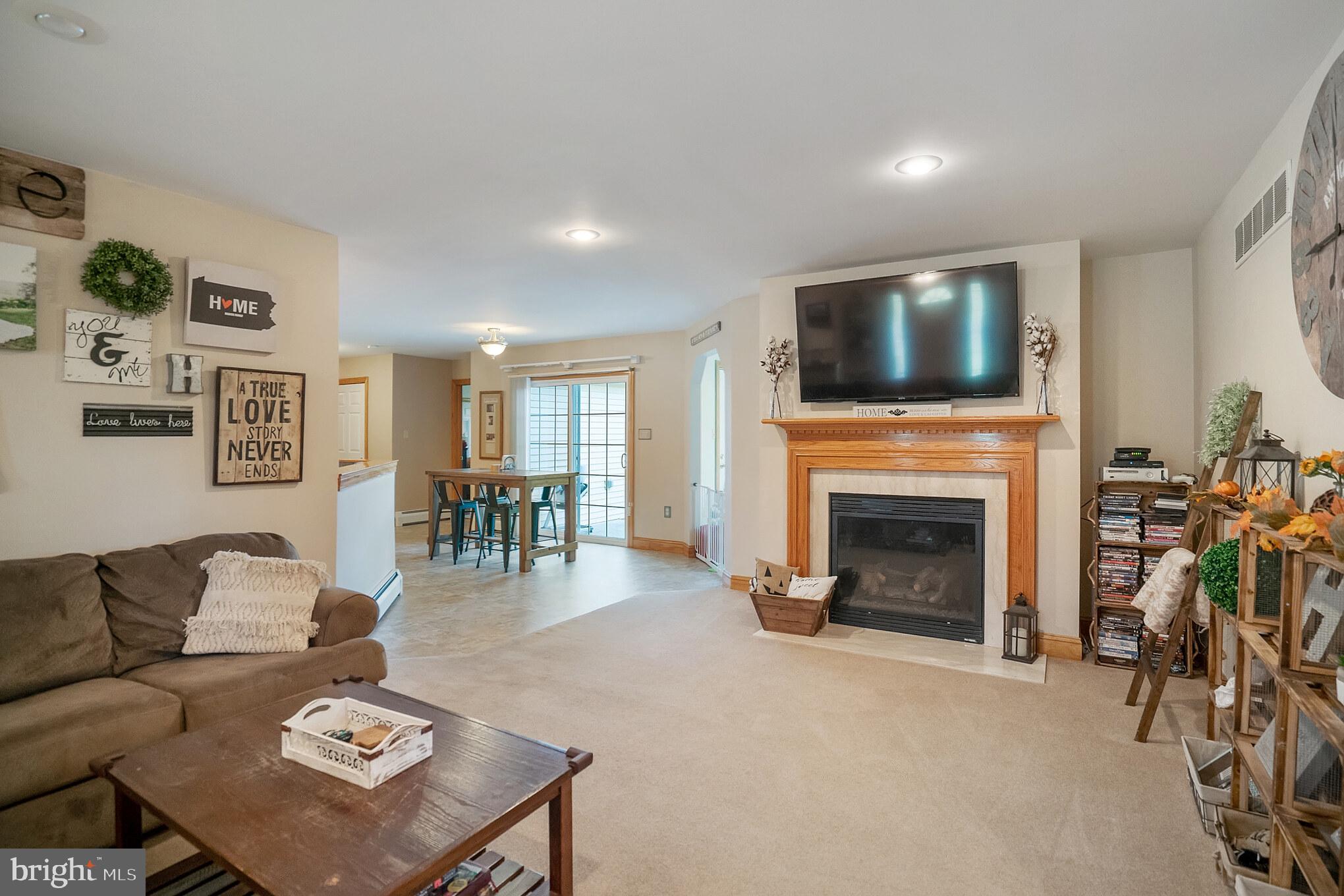 1714 Keith Drive Hellertown, PA 18055 - Photo 10 of 31 Living room with cozy fireplace