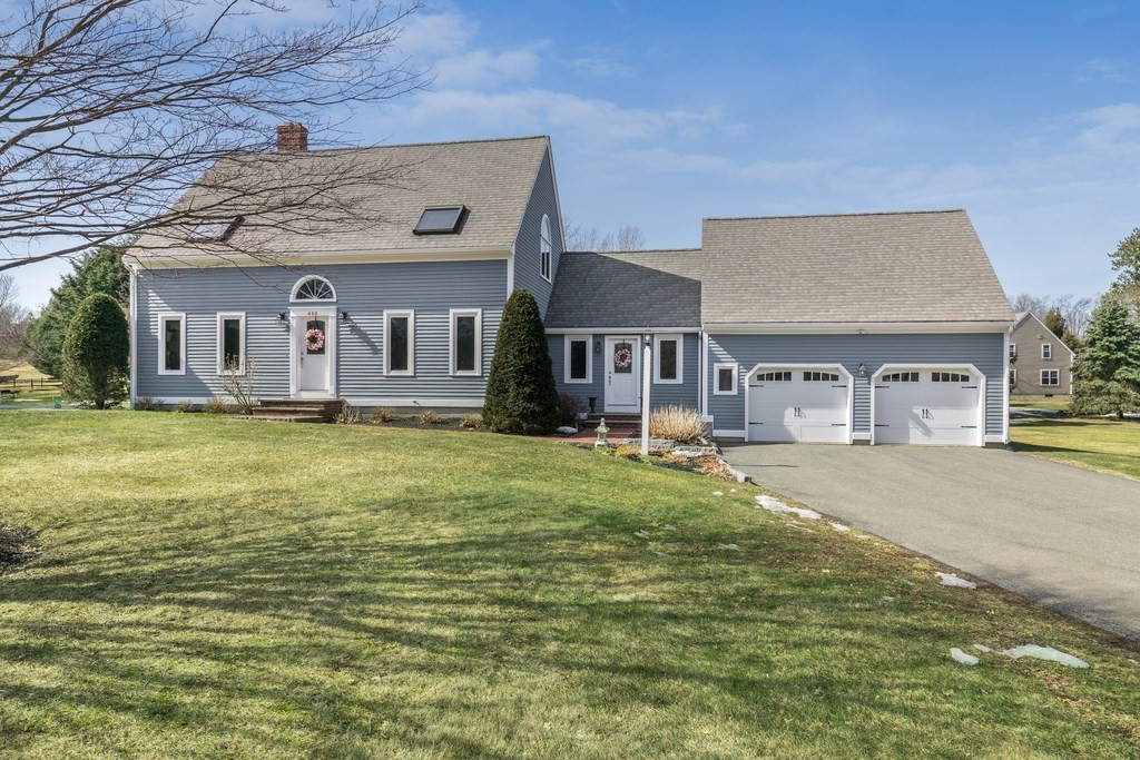 450 Main Street Rowley, MA 01969 - Photo 1 of 27 a large pool with lawn chairs