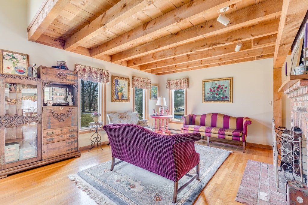 450 Main Street Rowley, MA 01969 - Photo 13 of 27 a living room with furniture and a table