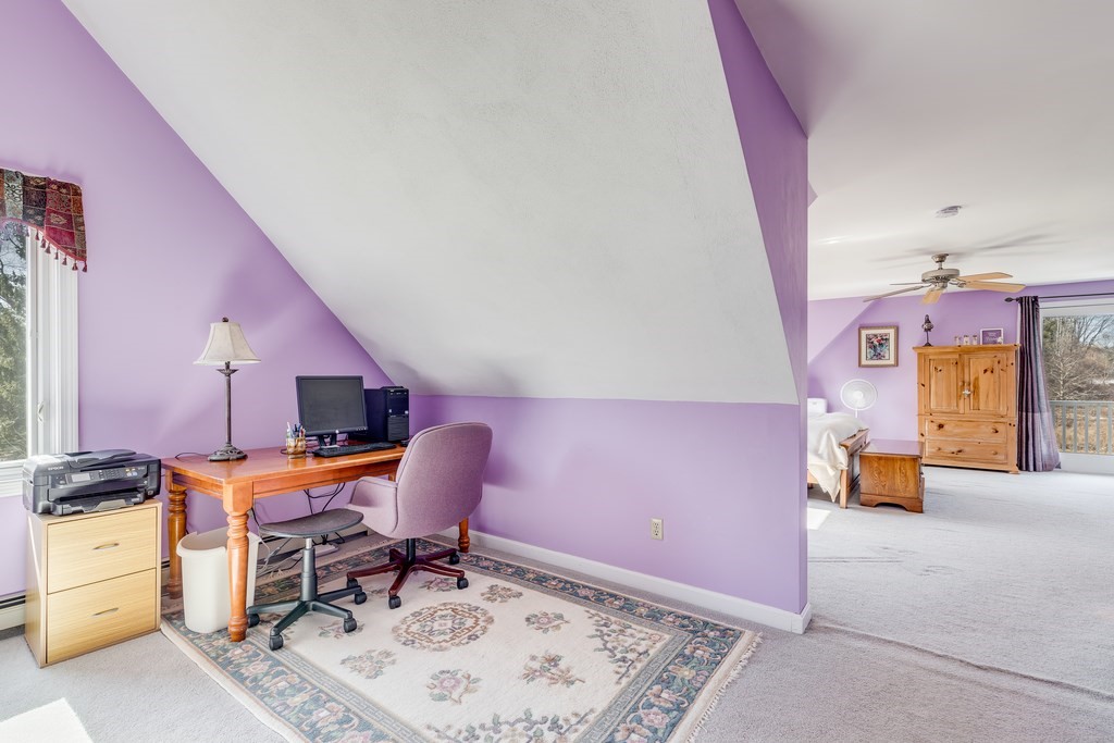 450 Main Street Rowley, MA 01969 - Photo 19 of 27 a room with furniture and a couch