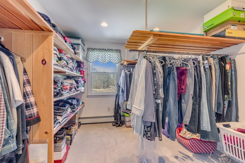 450 Main Street Rowley, MA 01969 - Photo 23 of 27 a view of walk in closet with clothes