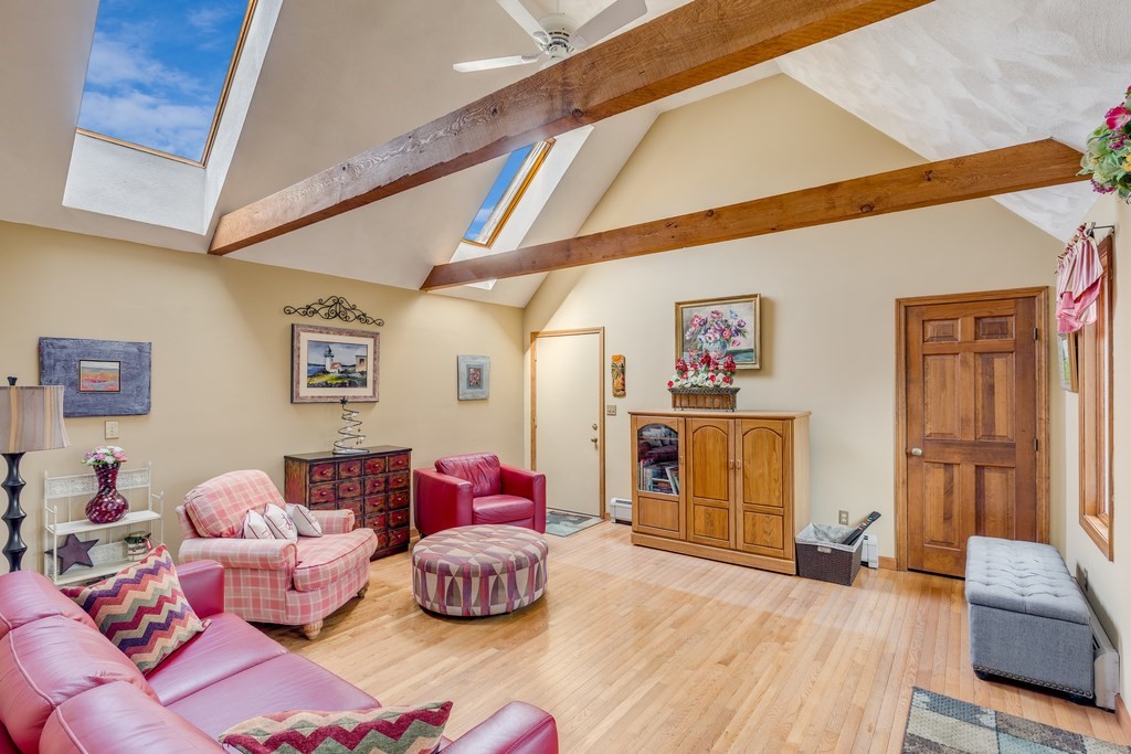 450 Main Street Rowley, MA 01969 - Photo 4 of 27 a bedroom with furniture and wooden floor