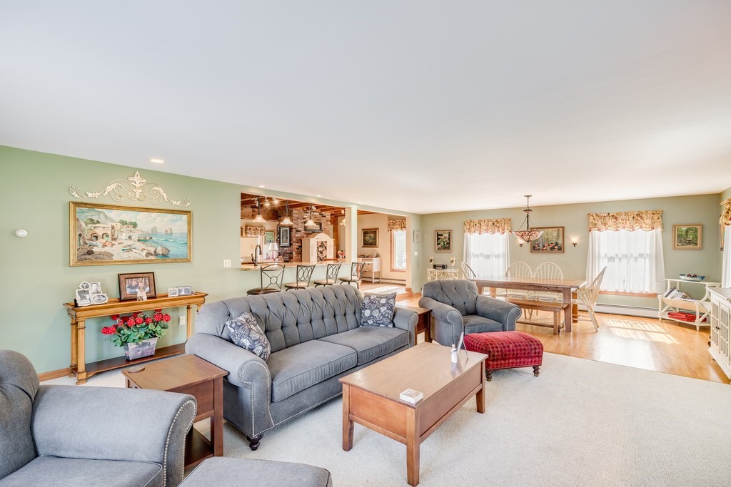 450 Main Street Rowley, MA 01969 - Photo 7 of 27 a living room with furniture and a large window