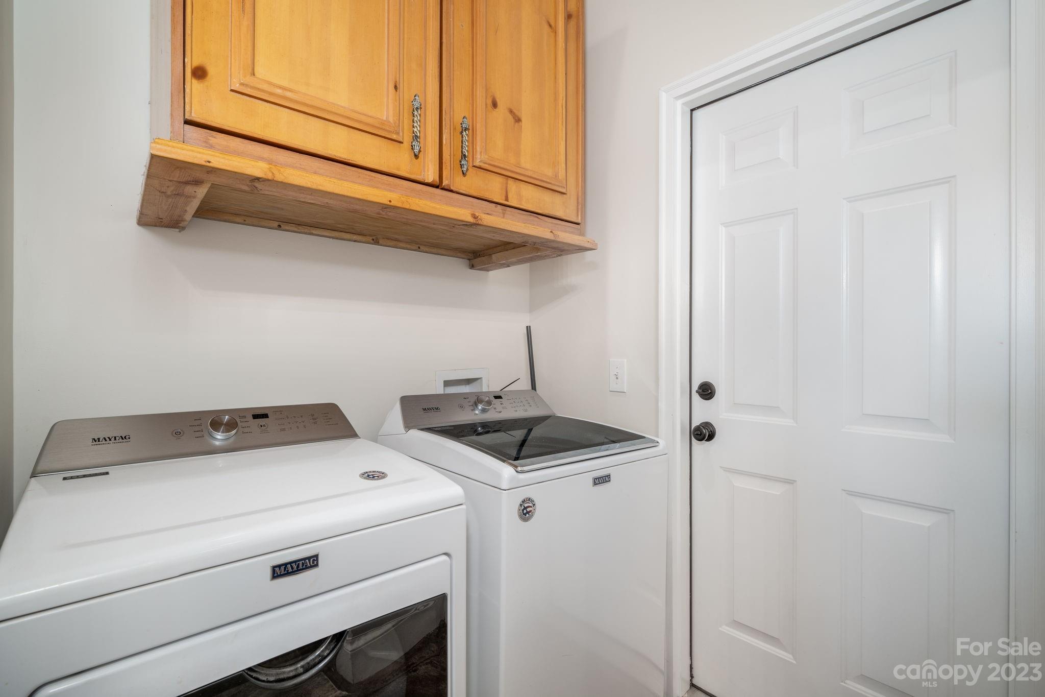 340 Foster Road Cleveland, NC 27013 - Photo 19 of 44 a utility room with dryer and washer