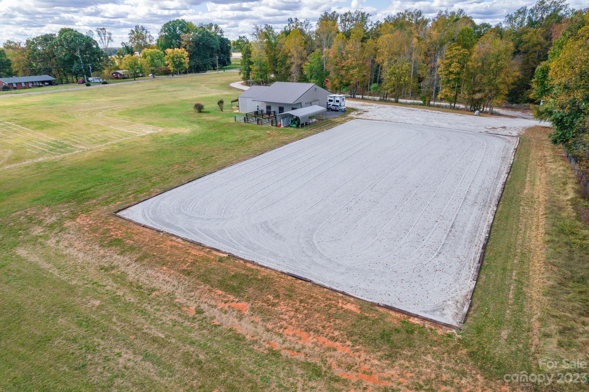 340 Foster Road Cleveland, NC 27013 - Photo 40 of 44 a view of a field with an ocean