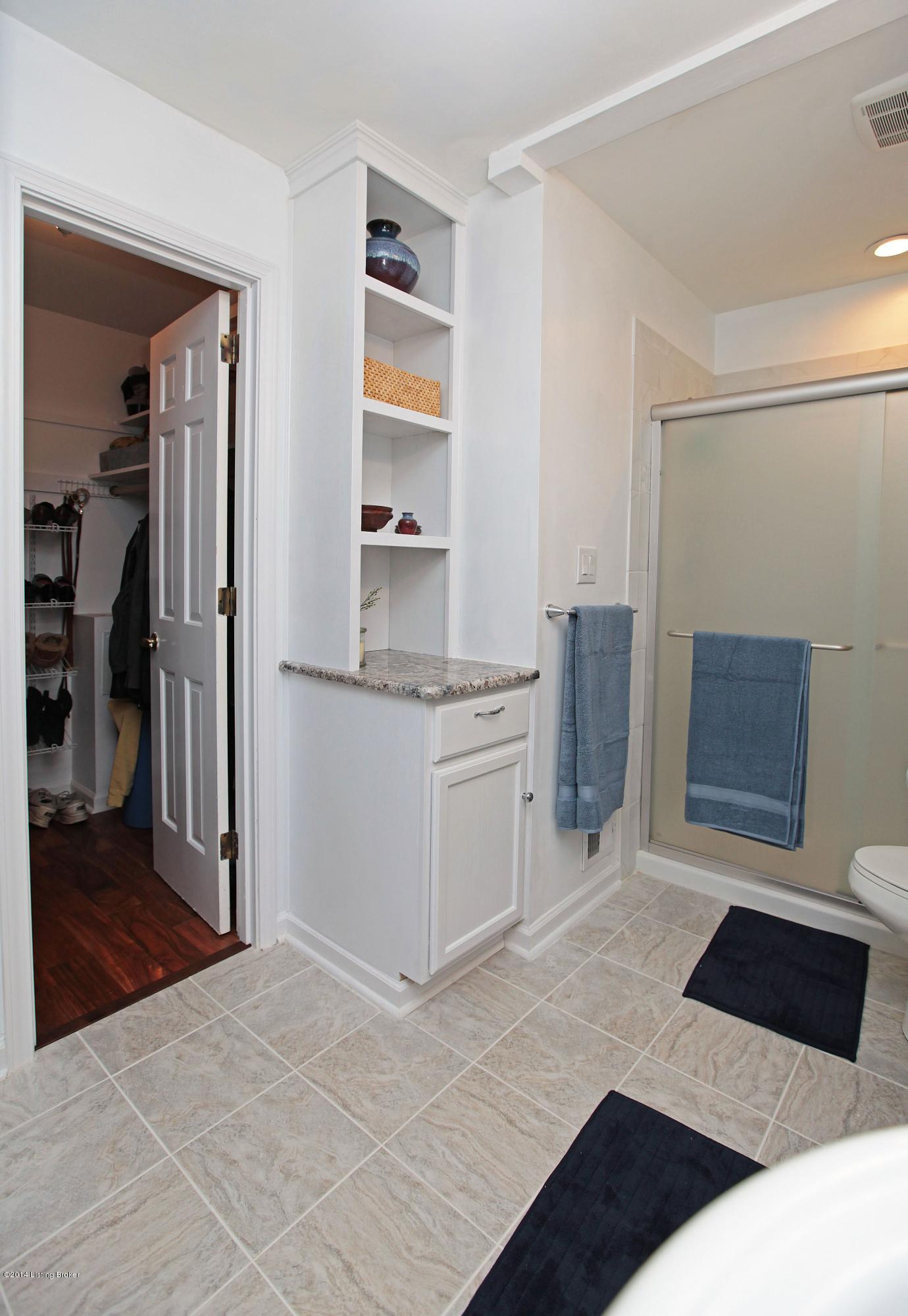 4 Lincoln Run Road Louisville, KY 40245 - Photo 21 of 36 Another view of master bath showing more storage and entrance to walk-in closet.