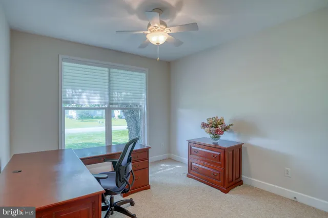 a view of parking garage with cars