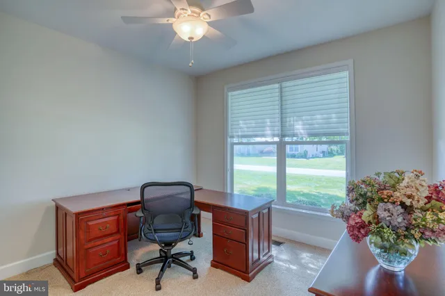 an aerial view of a house with a garden