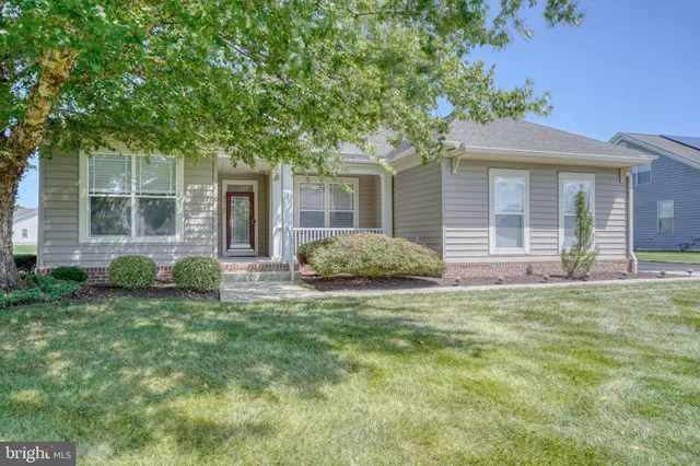 an aerial view of a house with a swimming pool